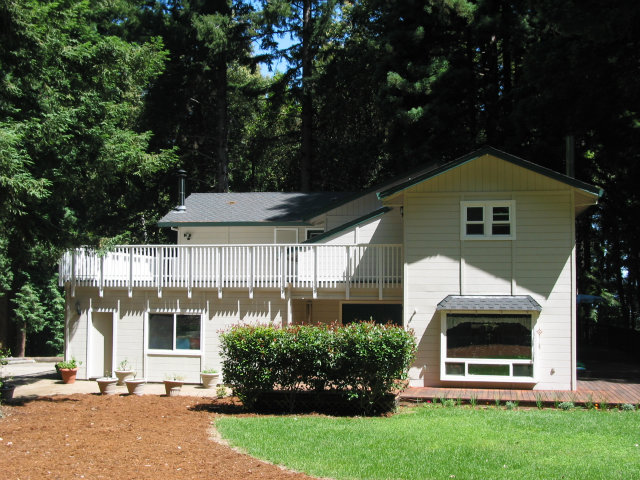 12533 Alba Road Ben Lomond, CA 95005 - Photo 1 of 12 a front view of a house with a yard