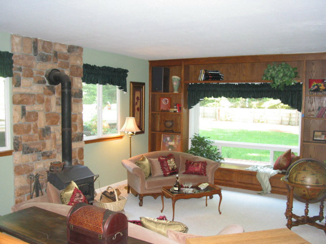 12533 Alba Road Ben Lomond, CA 95005 - Photo 5 of 12 a living room with furniture and a large window