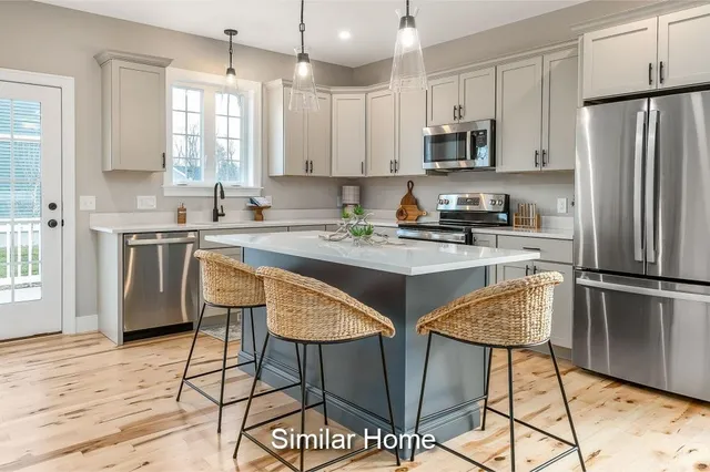 $935,900 | 1 Summerwind Place, Unit 1, Greenland, NH 03840