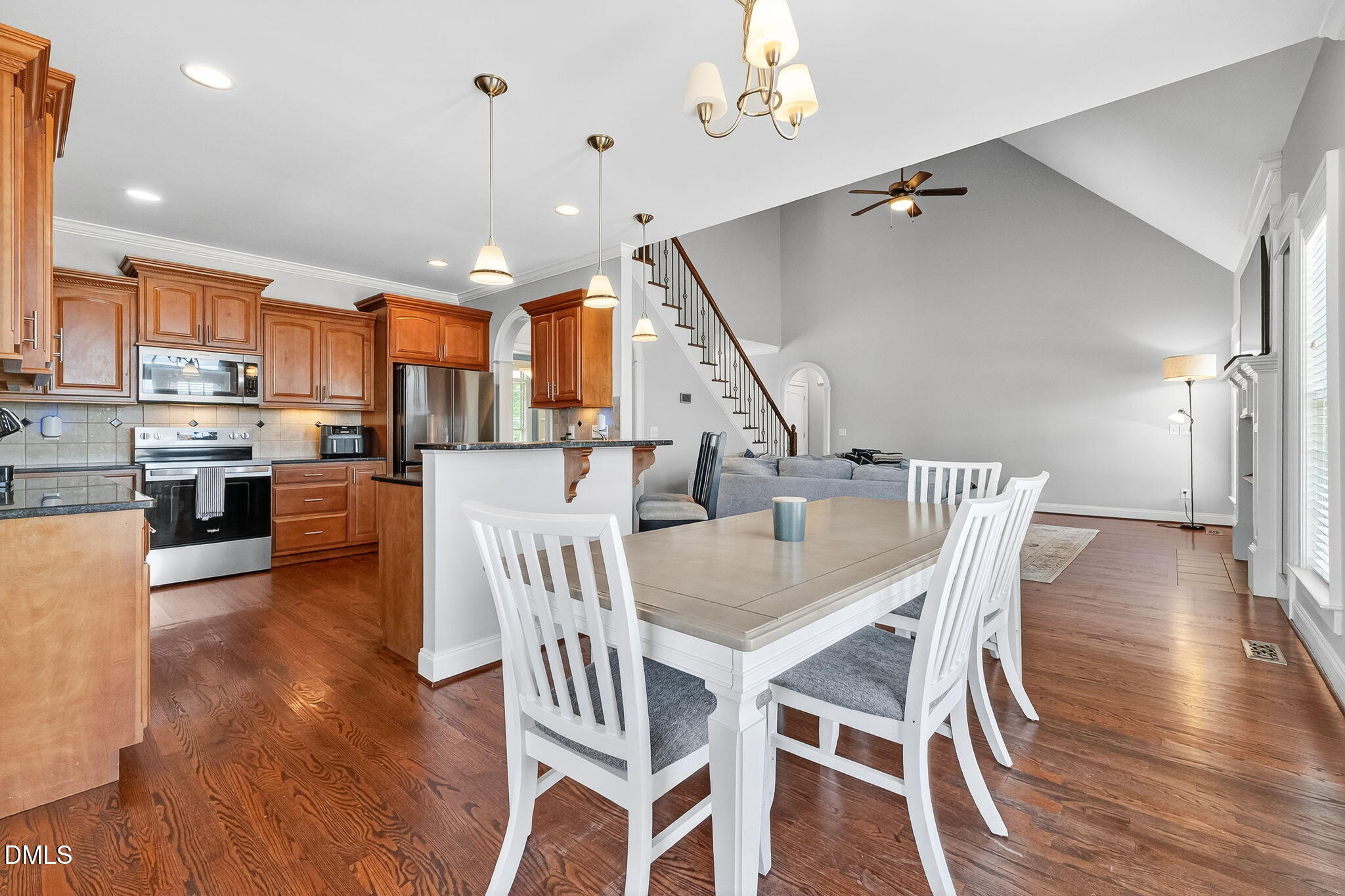 96 Jackson Ridge Court Willow Spring, NC 27592 - Photo 12 of 54 a view of a dining room with furniture and wooden floor