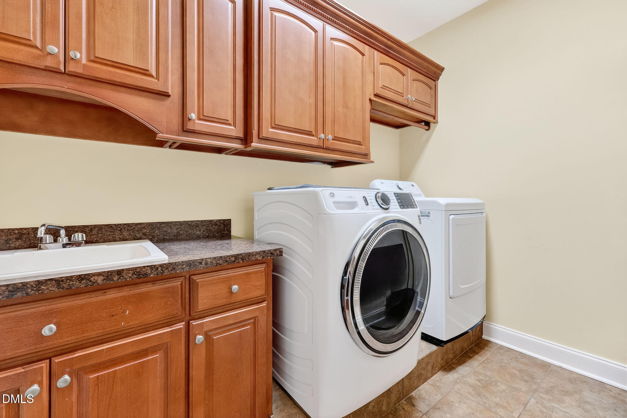 96 Jackson Ridge Court Willow Spring, NC 27592 - Photo 17 of 54 a utility room with dryer and washer