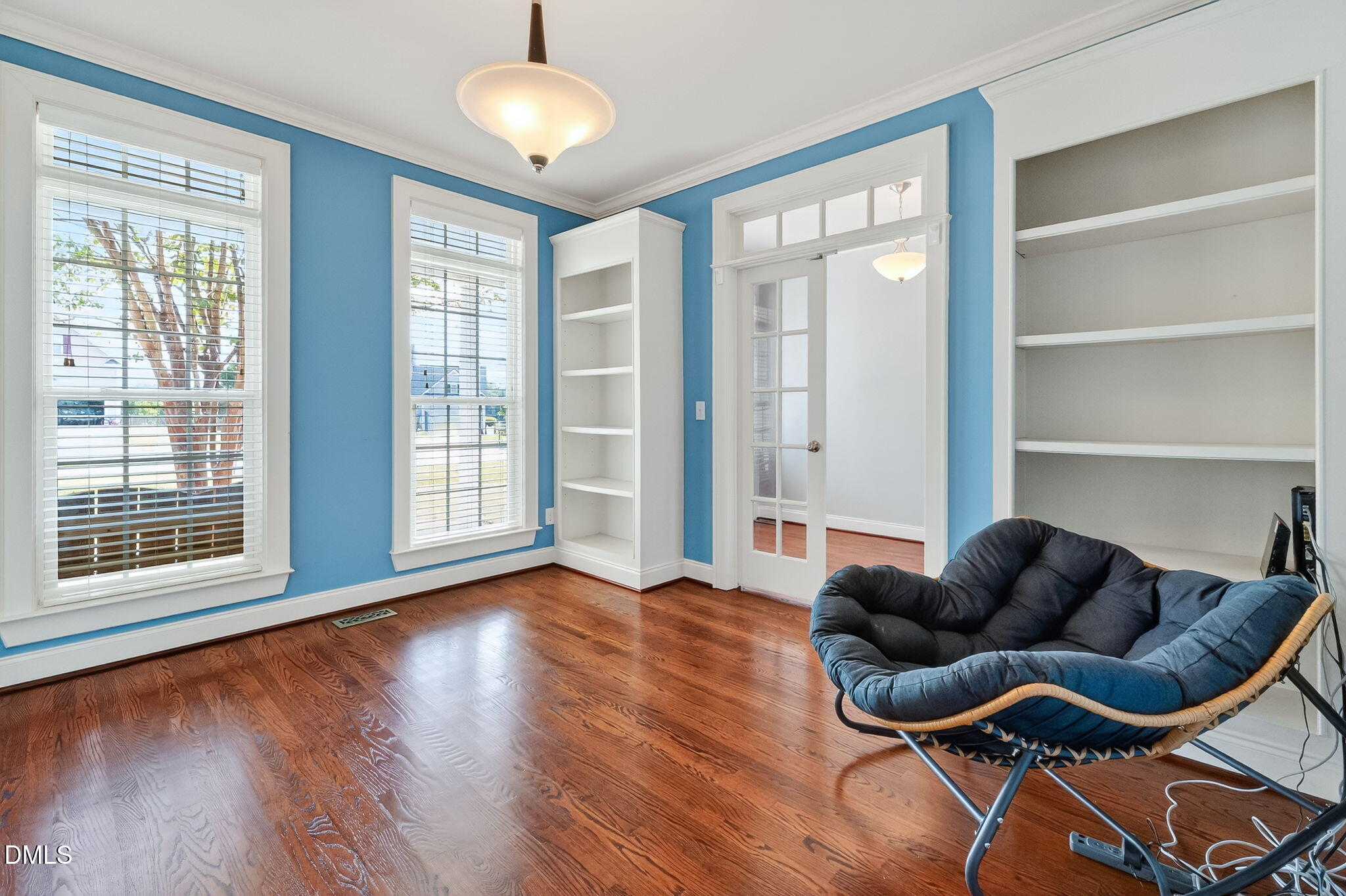 96 Jackson Ridge Court Willow Spring, NC 27592 - Photo 18 of 54 a living room with furniture a wooden floor and windows