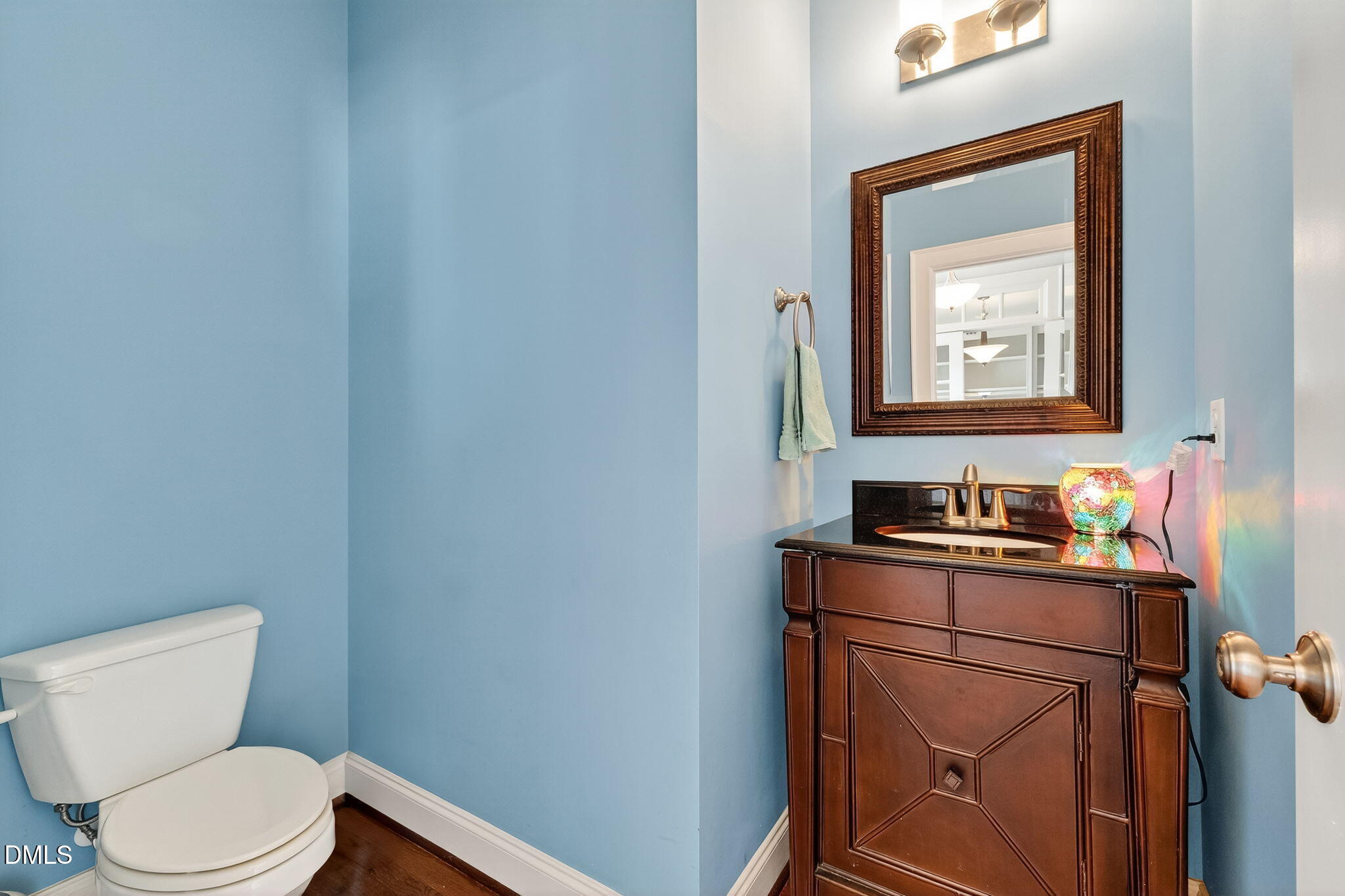 96 Jackson Ridge Court Willow Spring, NC 27592 - Photo 20 of 54 a bathroom with a toilet a sink and mirror