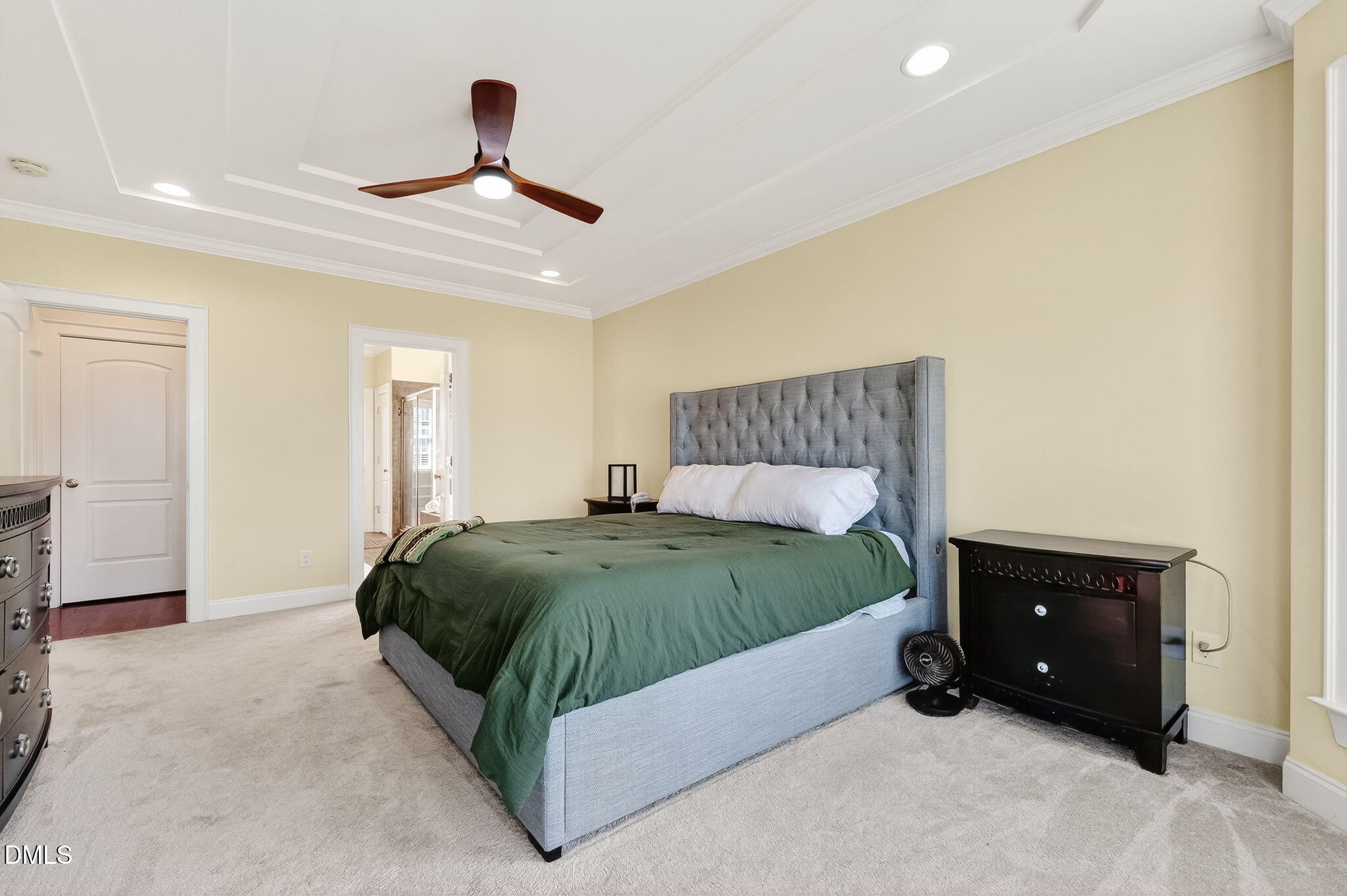 96 Jackson Ridge Court Willow Spring, NC 27592 - Photo 22 of 54 a bedroom with a bed and a ceiling fan