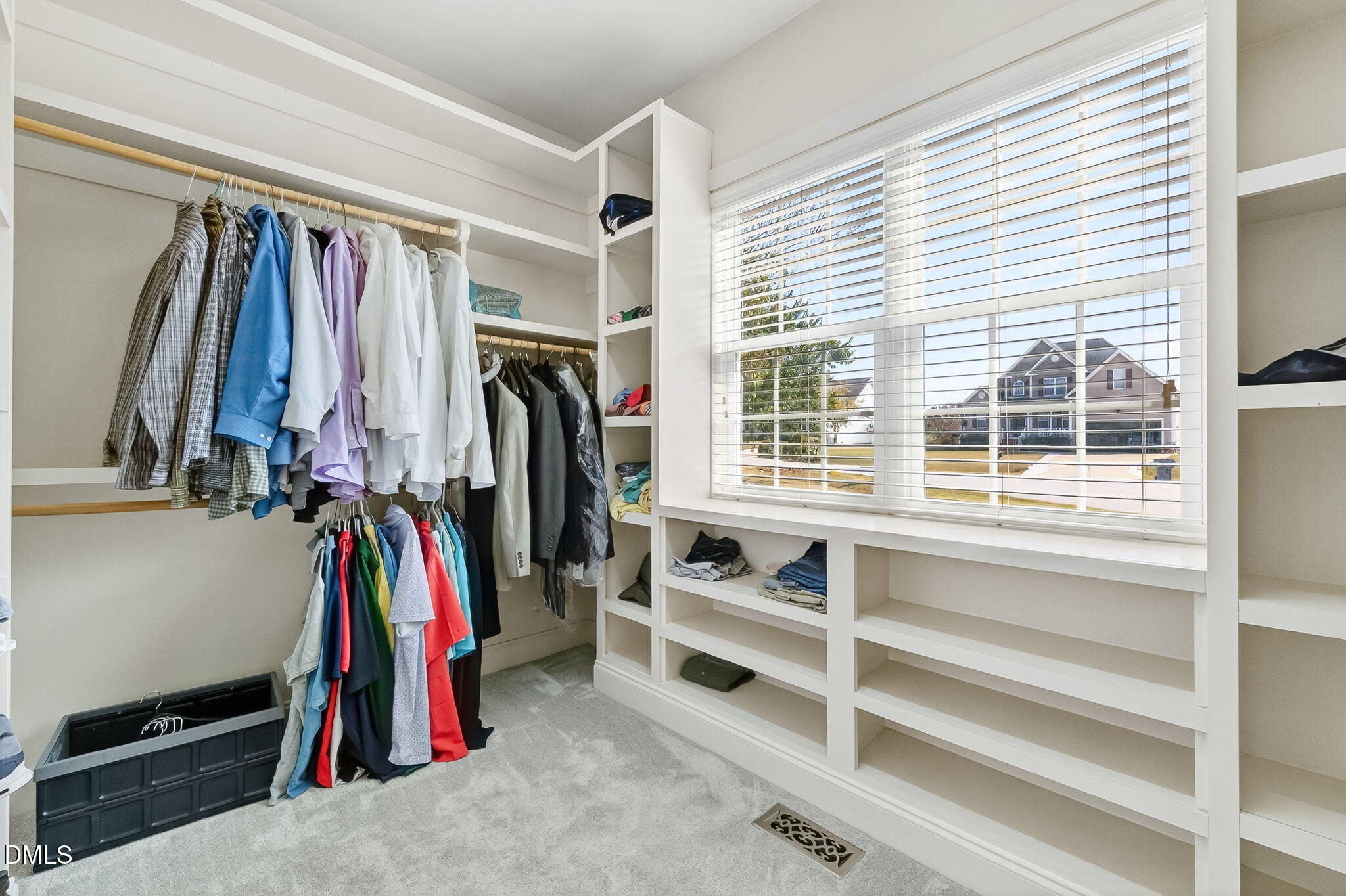 96 Jackson Ridge Court Willow Spring, NC 27592 - Photo 28 of 54 a view of walk in closet with clothes and shoes
