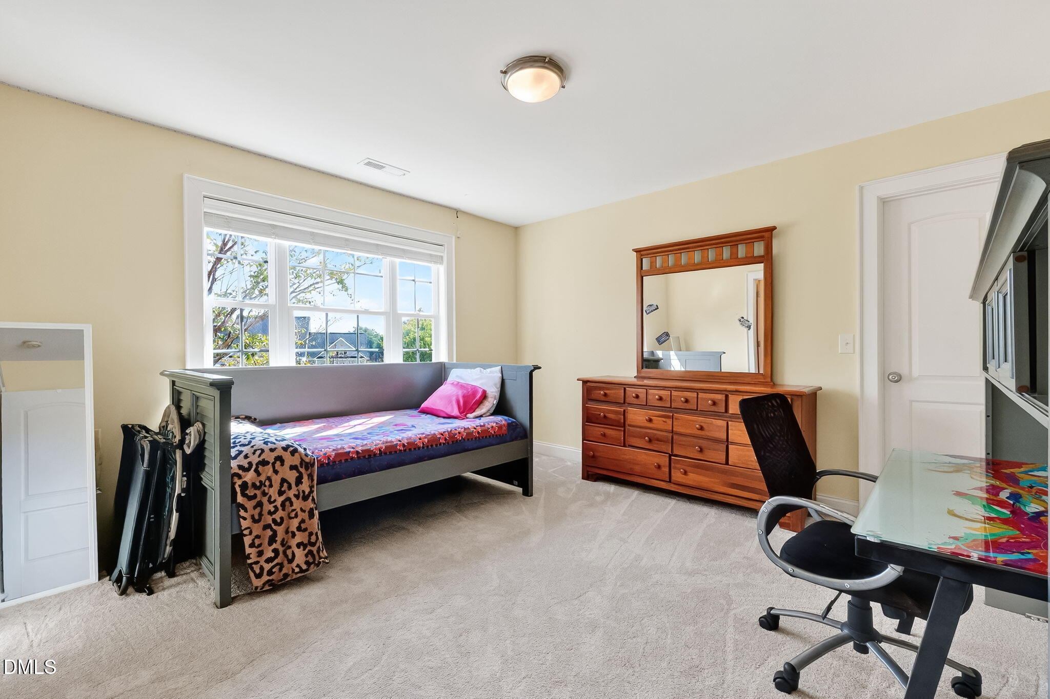 96 Jackson Ridge Court Willow Spring, NC 27592 - Photo 30 of 54 a bedroom with furniture and a window