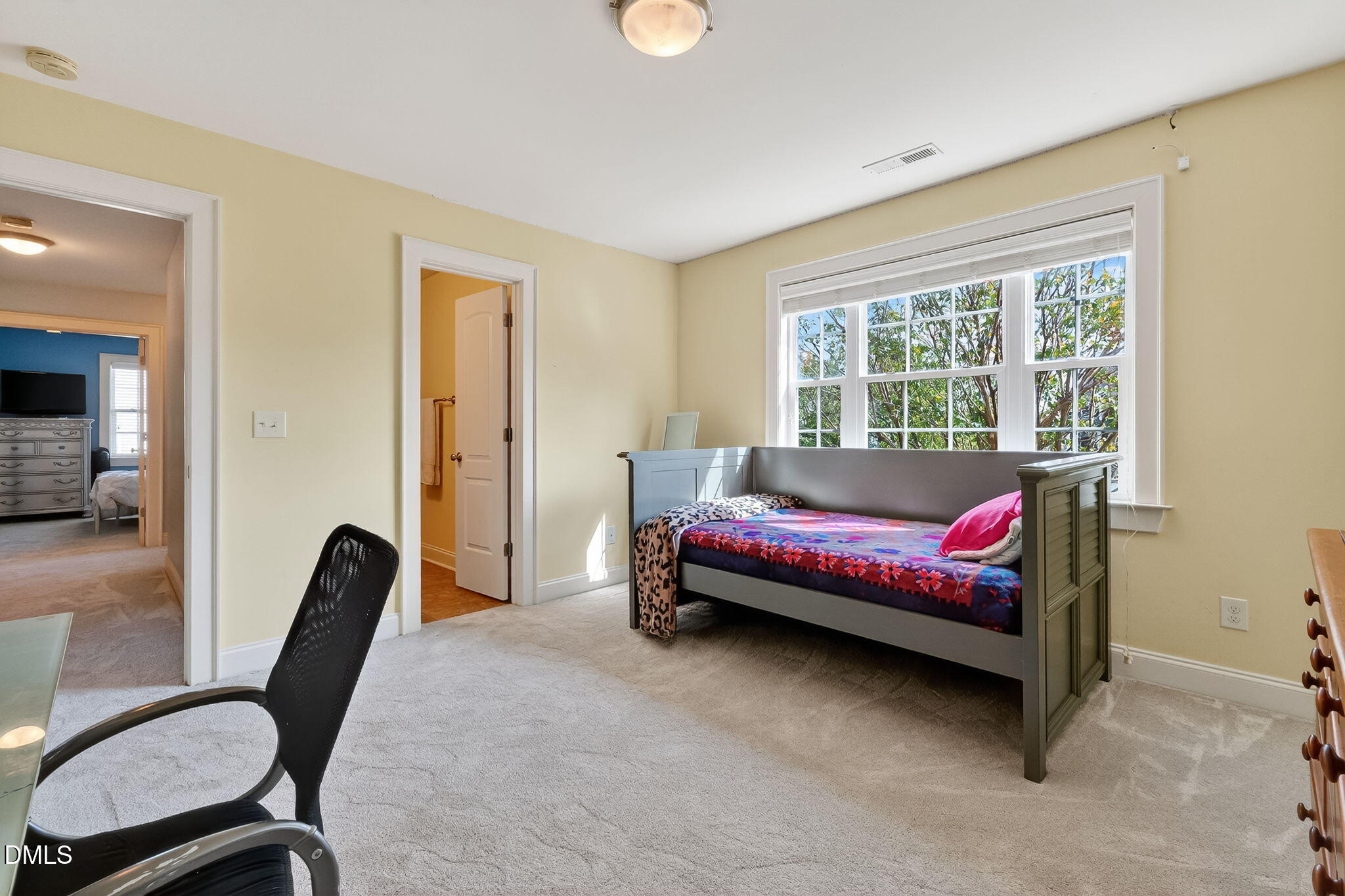 96 Jackson Ridge Court Willow Spring, NC 27592 - Photo 32 of 54 a bedroom with bed and a window