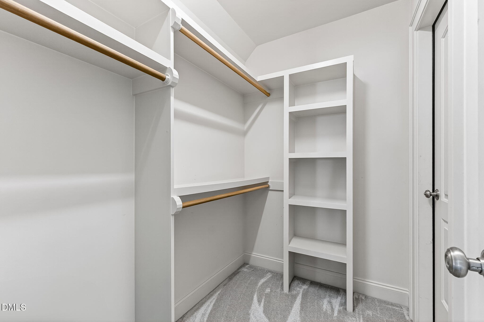 96 Jackson Ridge Court Willow Spring, NC 27592 - Photo 34 of 54 a view of an empty walk in closet