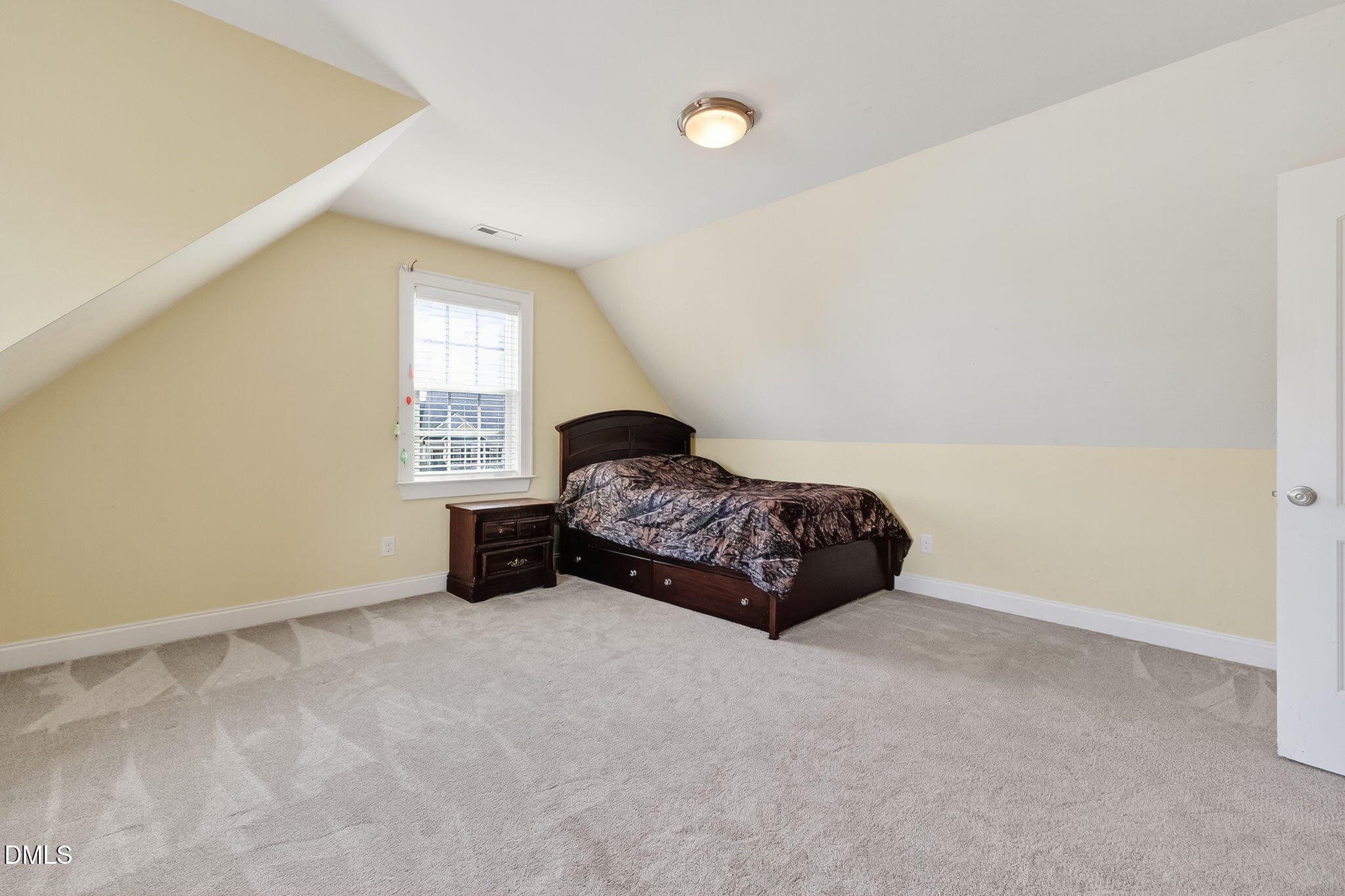 96 Jackson Ridge Court Willow Spring, NC 27592 - Photo 35 of 54 a bedroom with a bed a window and closet