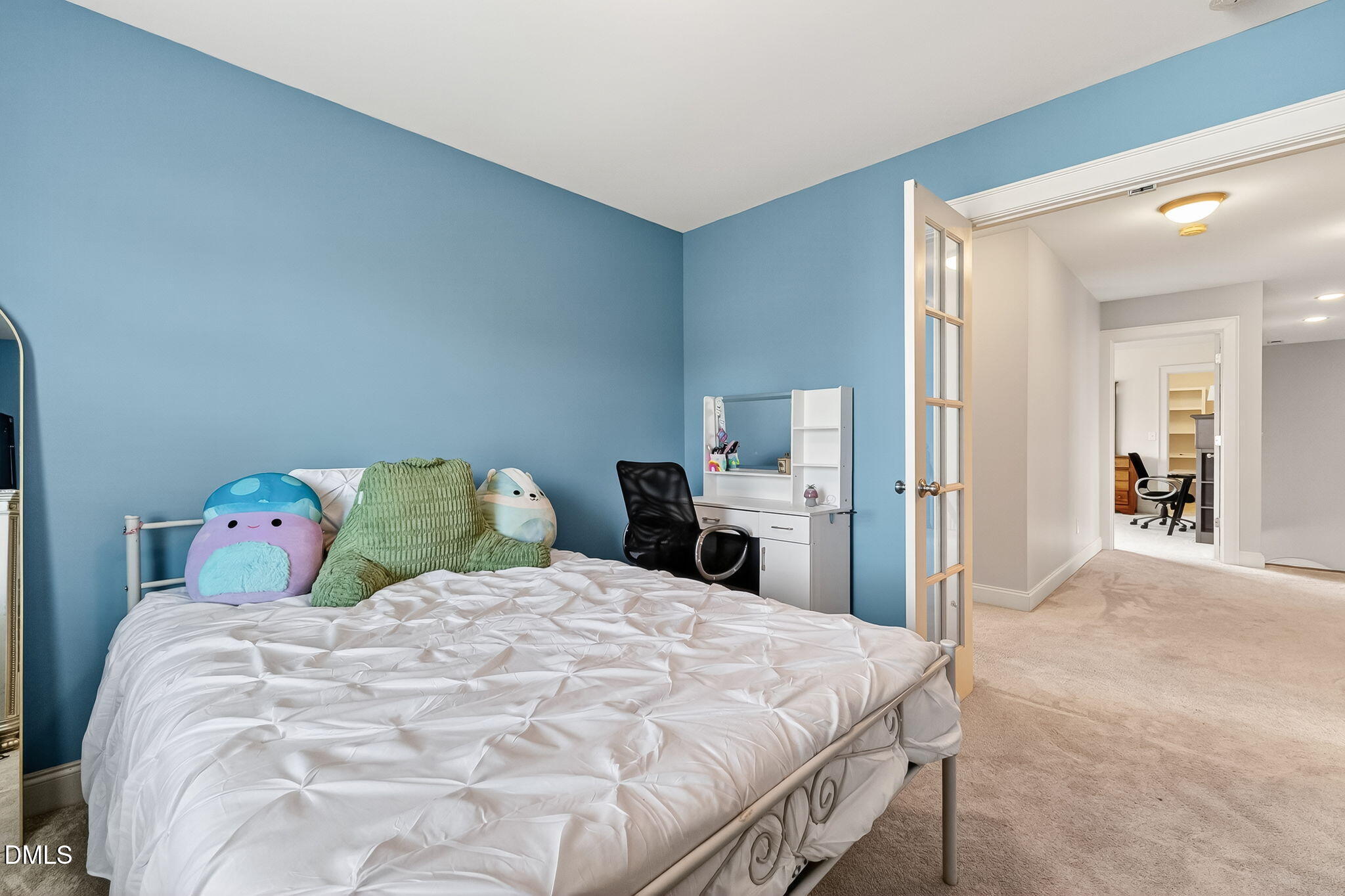 96 Jackson Ridge Court Willow Spring, NC 27592 - Photo 38 of 54 a large bed sitting in a bedroom and a lamp