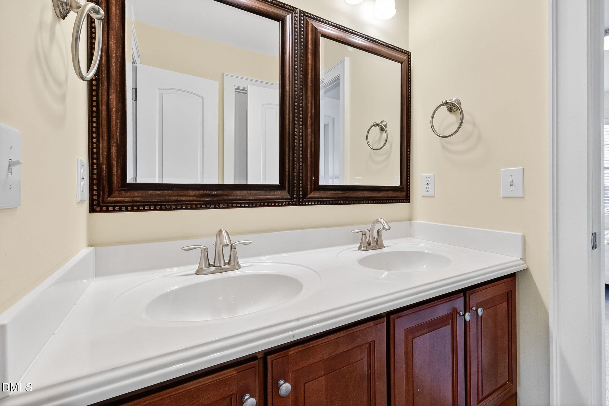 96 Jackson Ridge Court Willow Spring, NC 27592 - Photo 39 of 54 a bathroom with double vanity sink and two mirror