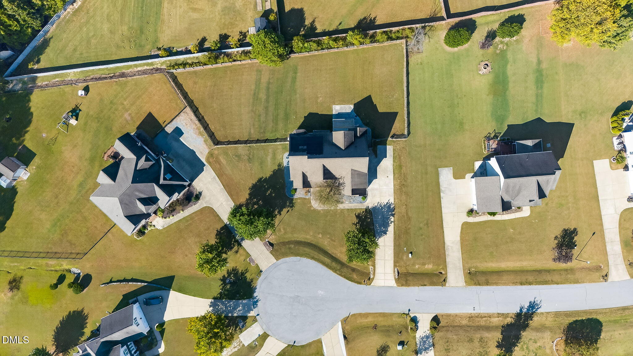 96 Jackson Ridge Court Willow Spring, NC 27592 - Photo 48 of 54 an aerial view of a house with swimming pool
