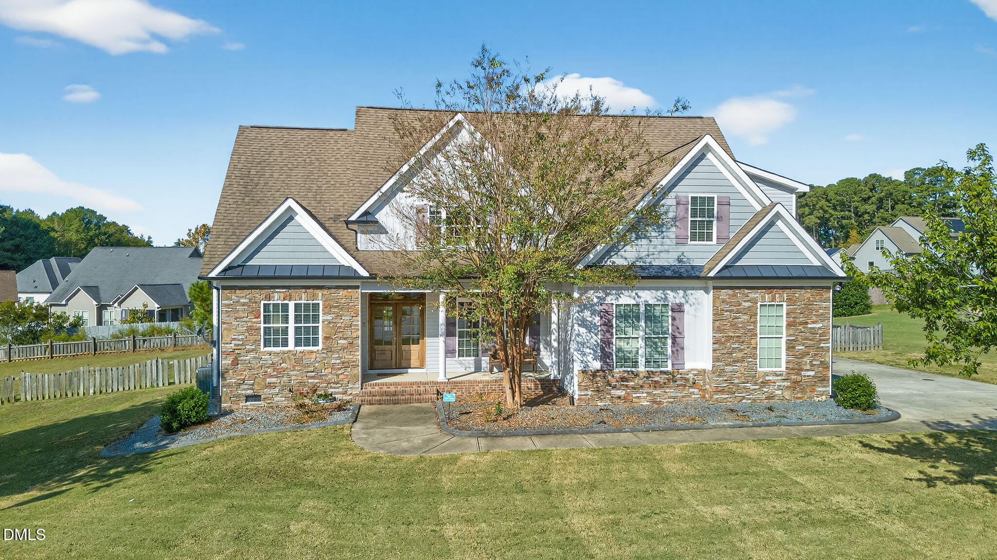 96 Jackson Ridge Court Willow Spring, NC 27592 - Photo 50 of 54 front view of house with a yard