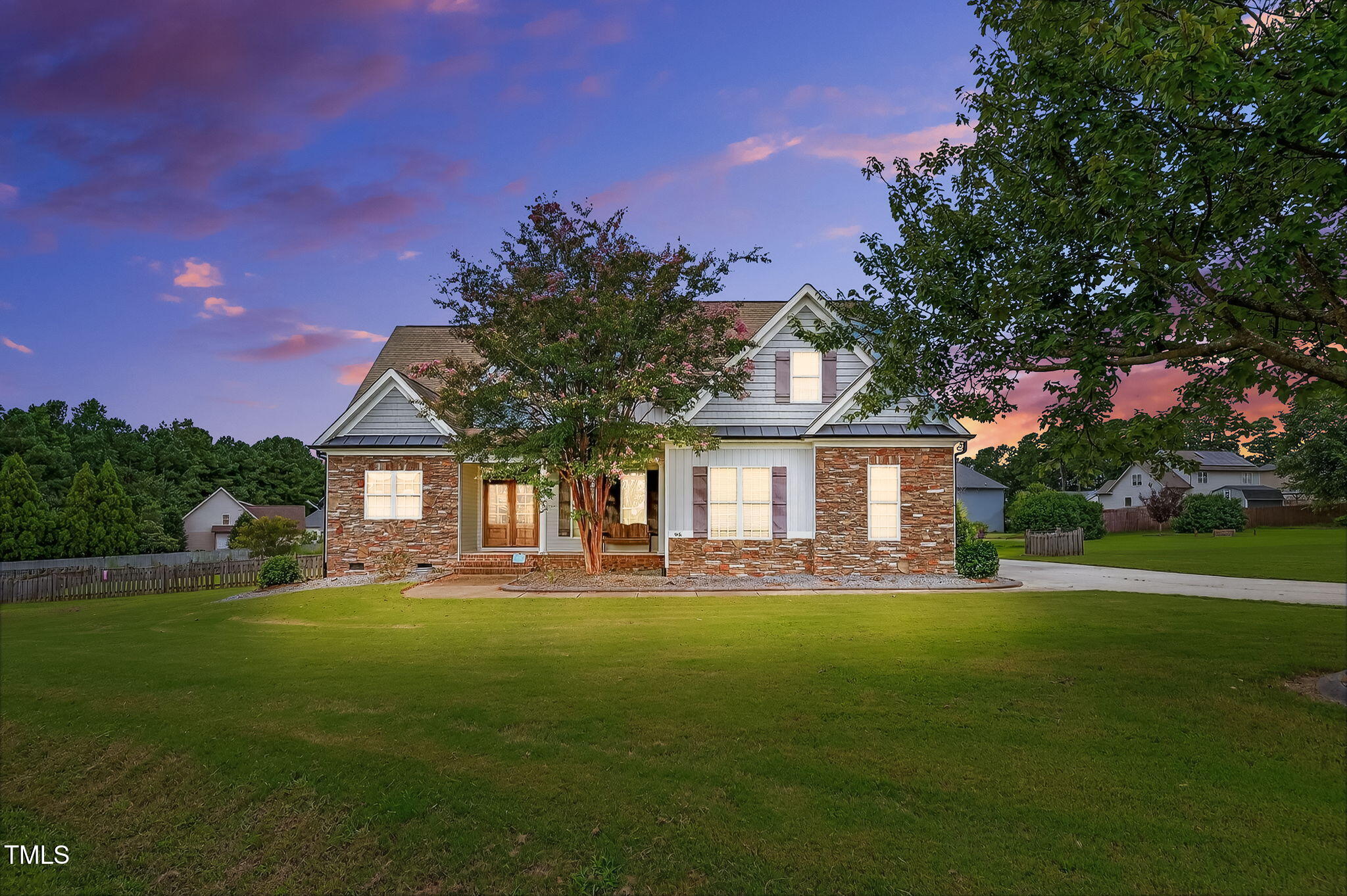 96 Jackson Ridge Court Willow Spring, NC 27592 - Photo 51 of 54 a front view of house with yard and green space