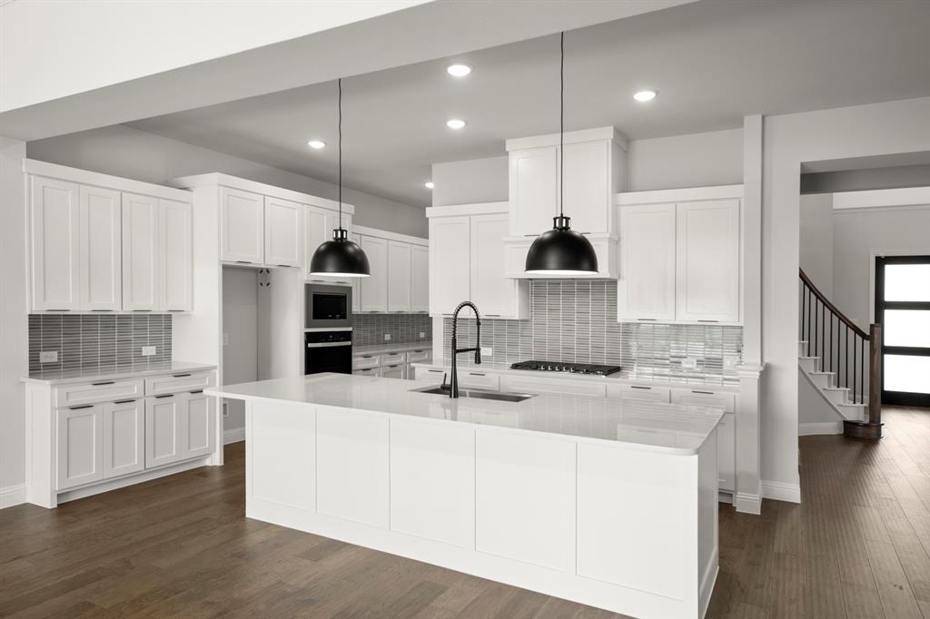 309 Bee Balm Road McKinney, TX 75071 - Photo 16 of 40 09. 309 Bee Balm - Kitchen (2)