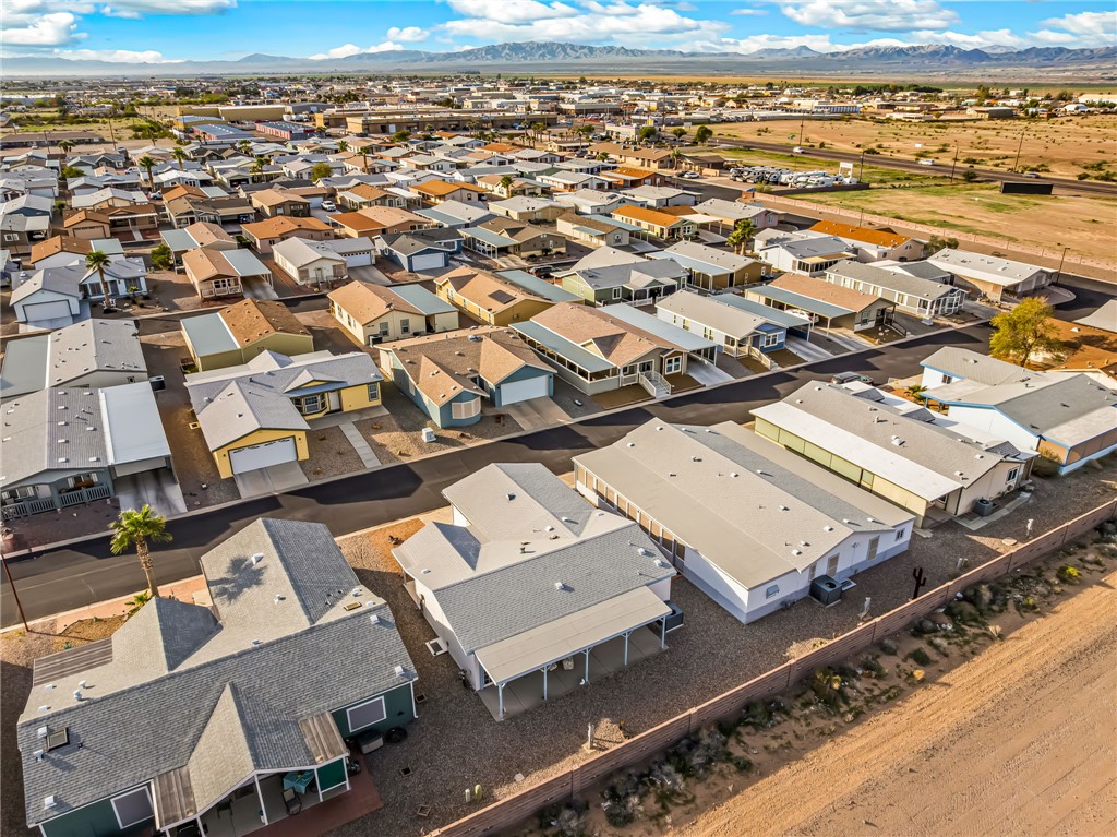 1545 East El Rodeo Road, Unit 166 Fort Mohave, AZ 86426 - Photo 33 of 40 Aerial view of residential area with a mountain backdrop