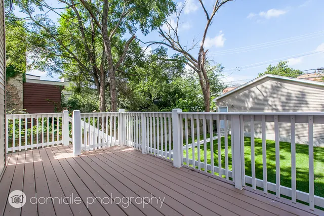 a view of a wooden roof with wooden floor and fence