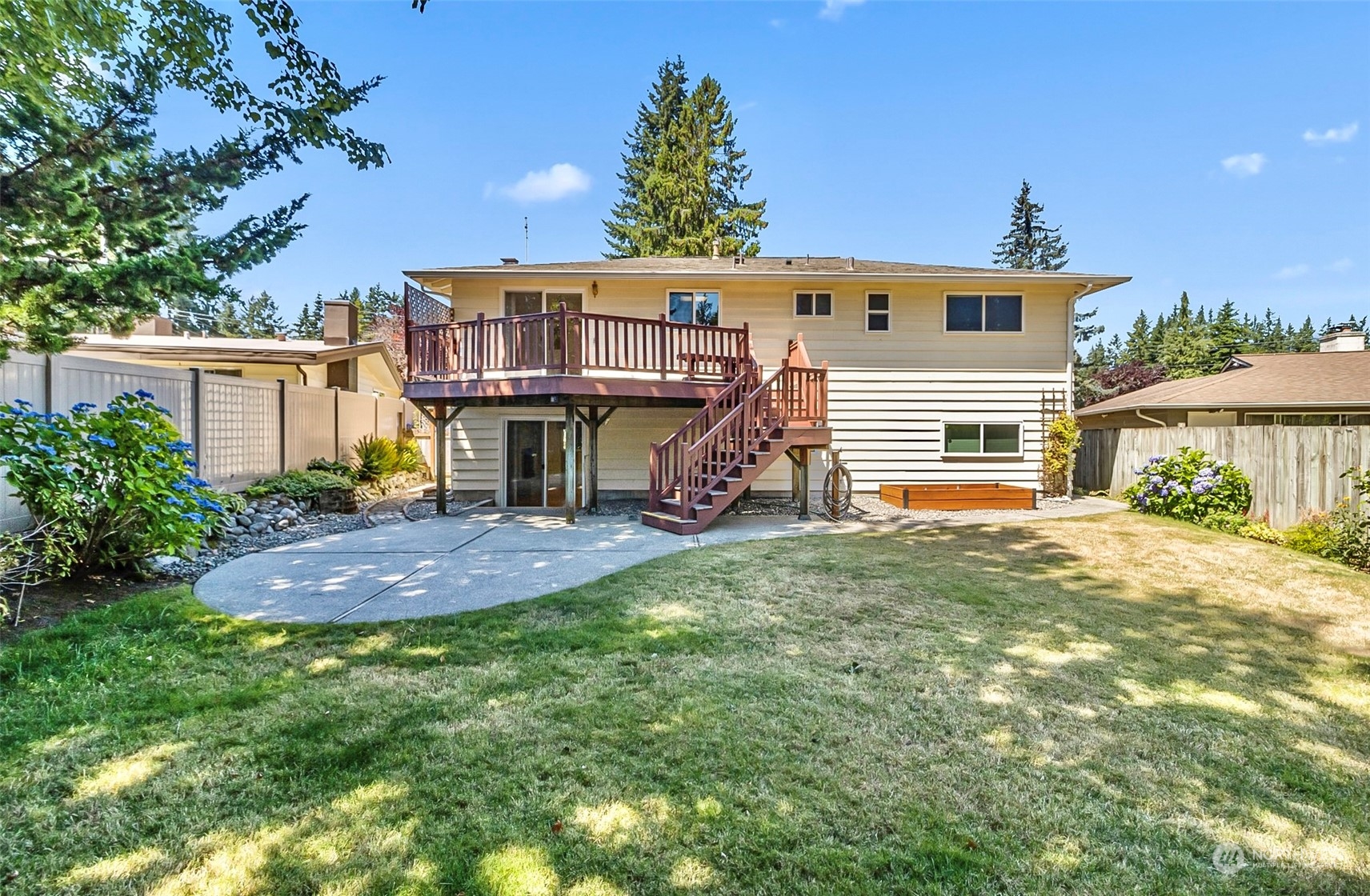 2520 166th Avenue Northeast Bellevue, WA 98008 - Photo 2 of 40 a front view of a house with a yard