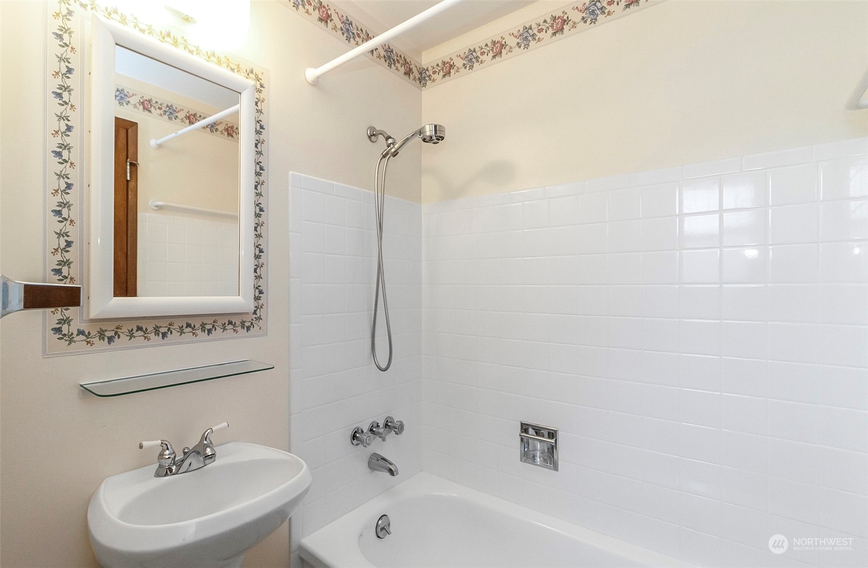 2520 166th Avenue Northeast Bellevue, WA 98008 - Photo 30 of 40 a bathroom with a sink a mirror and a shower