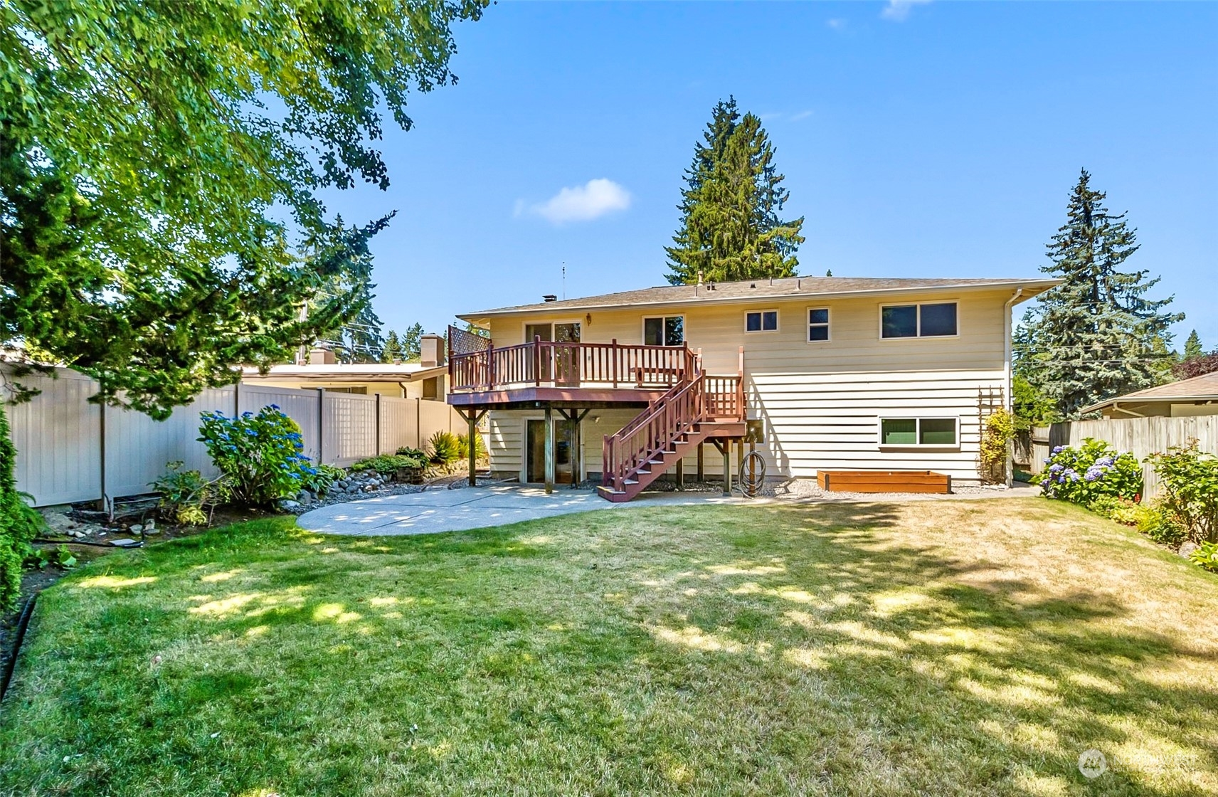 2520 166th Avenue Northeast Bellevue, WA 98008 - Photo 3 of 40 a view of a house with a yard and a tree
