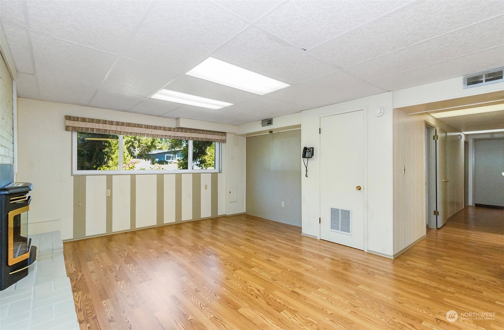 2520 166th Avenue Northeast Bellevue, WA 98008 - Photo 32 of 40 wooden floor in an empty room with a window
