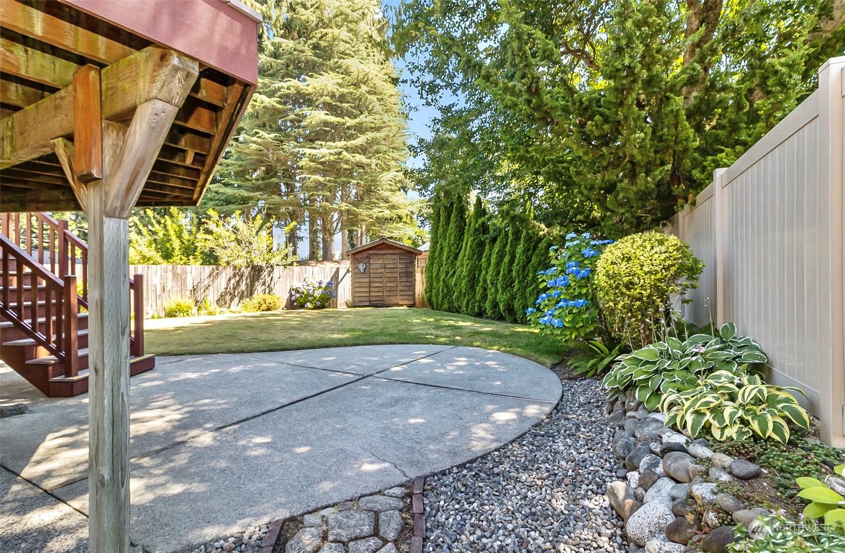 2520 166th Avenue Northeast Bellevue, WA 98008 - Photo 4 of 40 a view of a yard with plants and a fountain