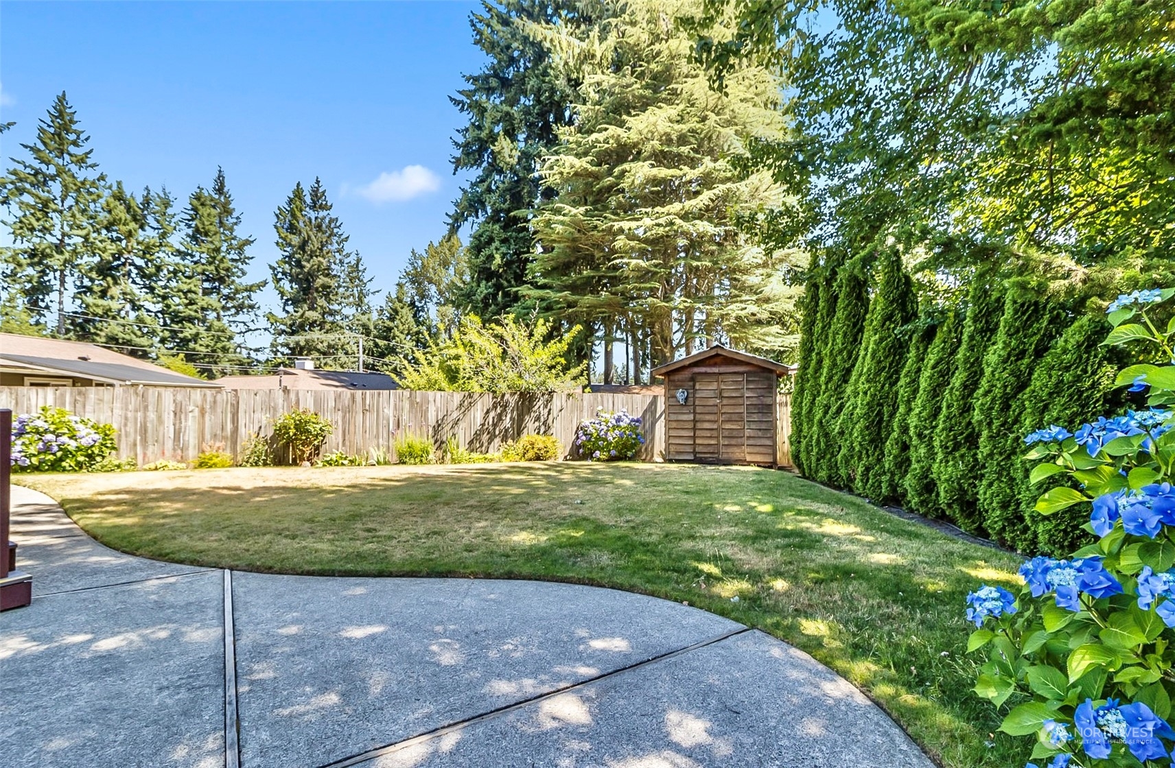 2520 166th Avenue Northeast Bellevue, WA 98008 - Photo 7 of 40 a view of a back yard of the house