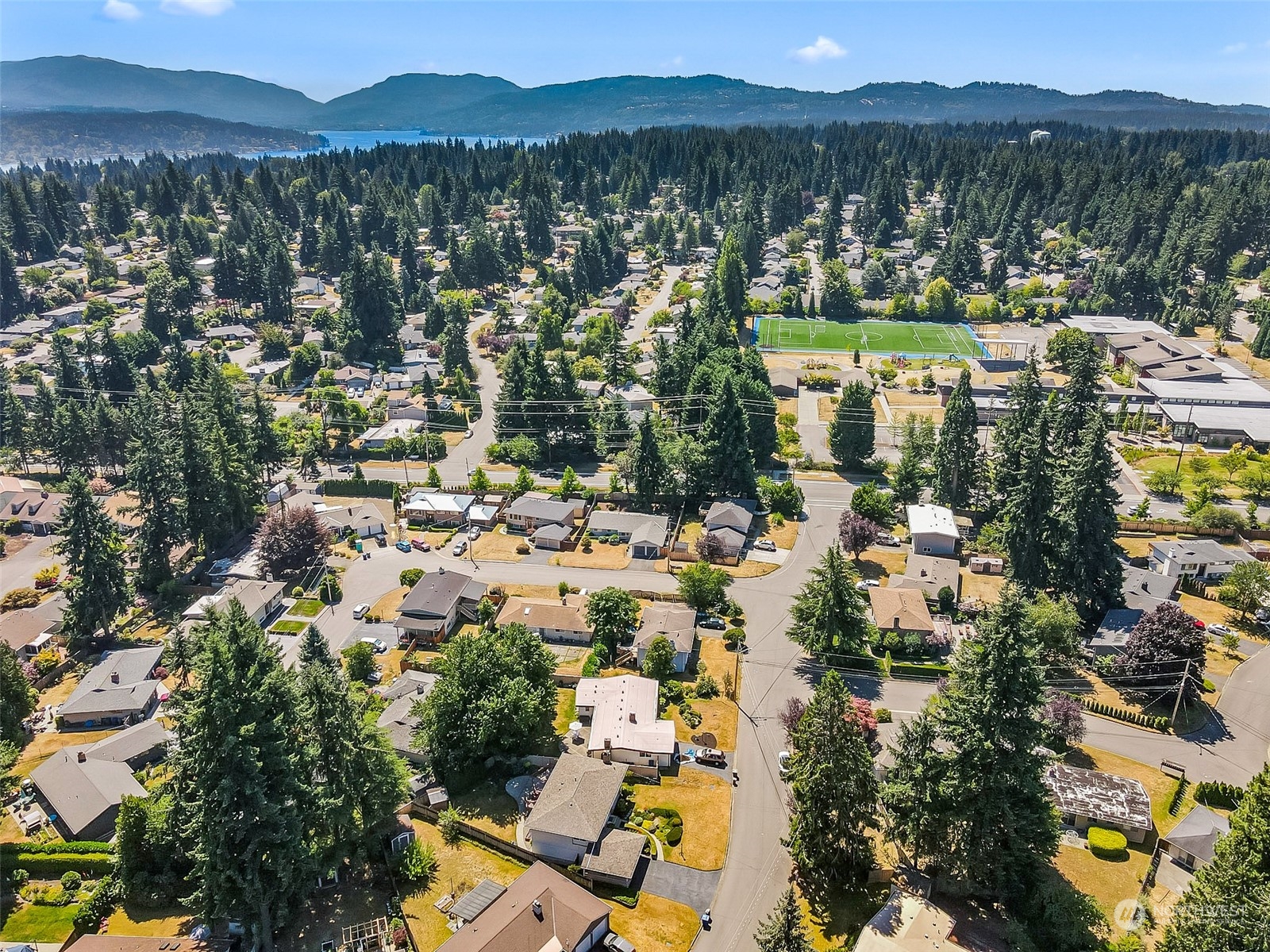 2520 166th Avenue Northeast Bellevue, WA 98008 - Photo 8 of 40 a view of lake and mountain view