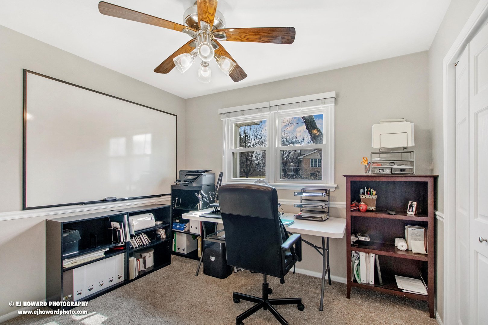 437 Illinois Road Frankfort, IL 60423 - Photo 29 of 35 a view of a workspace with furniture and a window
