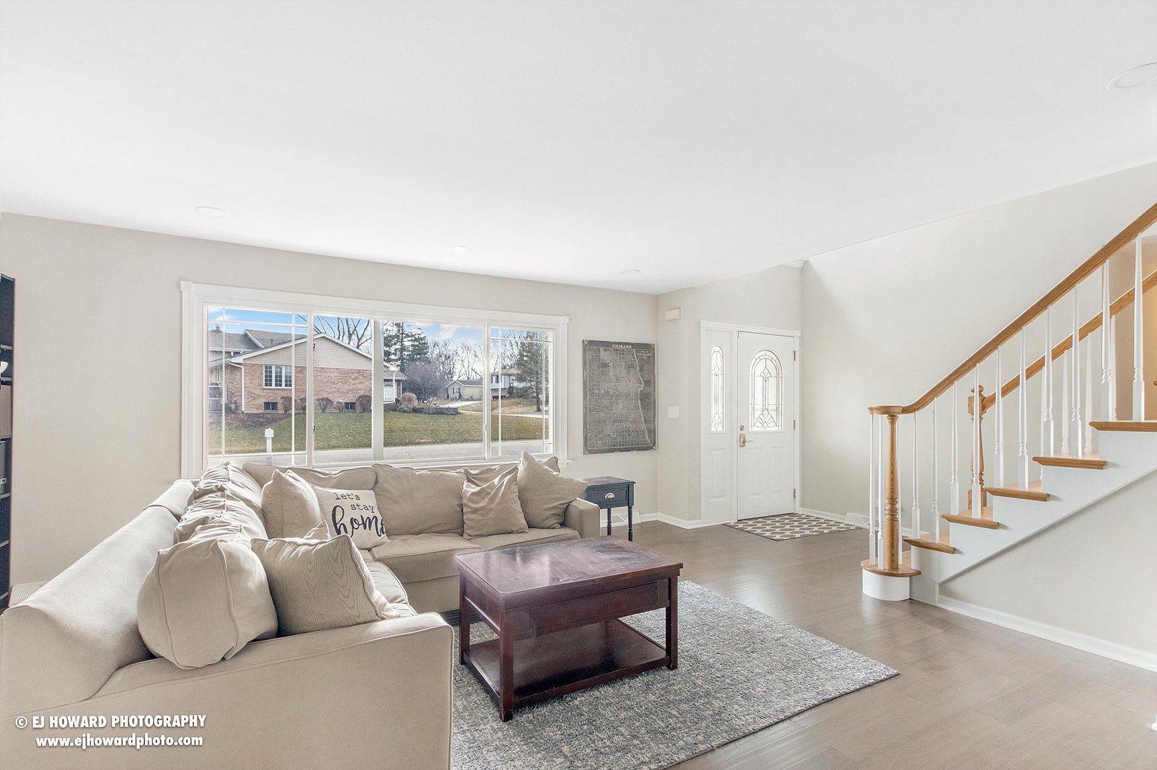 437 Illinois Road Frankfort, IL 60423 - Photo 7 of 35 a living room with furniture and a large window