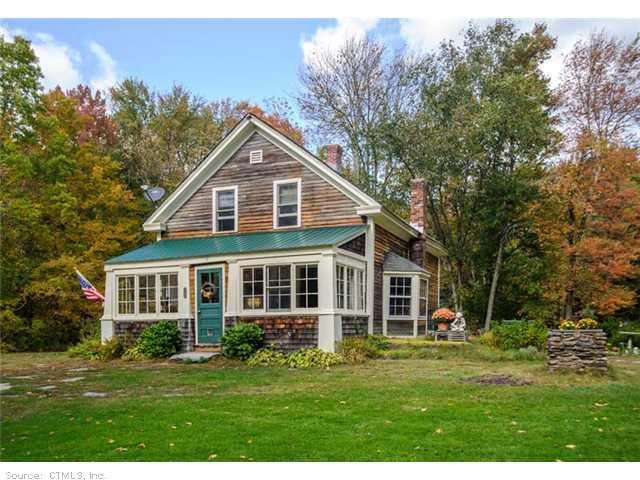 50 Webber Road Tolland, CT 06084 - Photo 1 of 1 a front view of a house with a yard