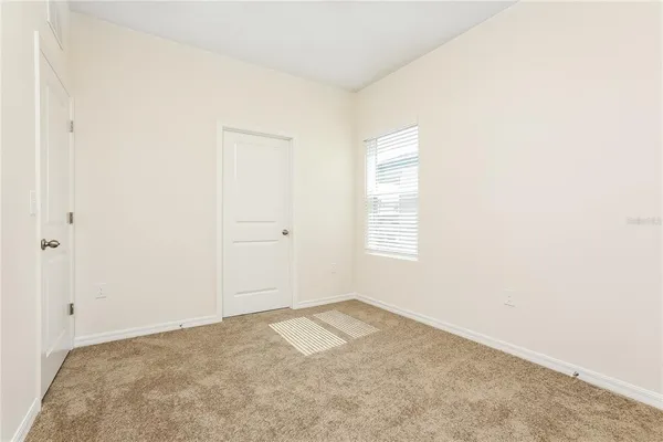 an empty room with an entryway