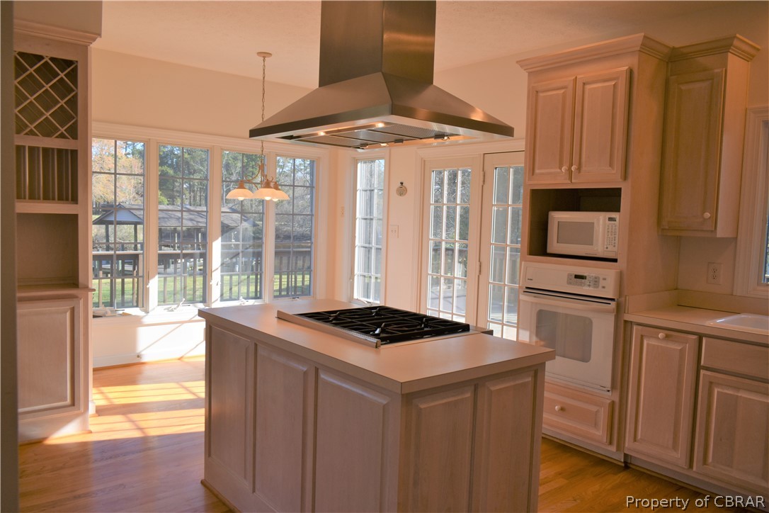 163 Mill Lane Road Cardinal, VA 23025 - Photo 20 of 50 a kitchen with a stove a sink and a refrigerator