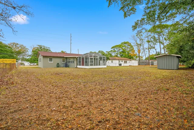 a view of backyard with green space