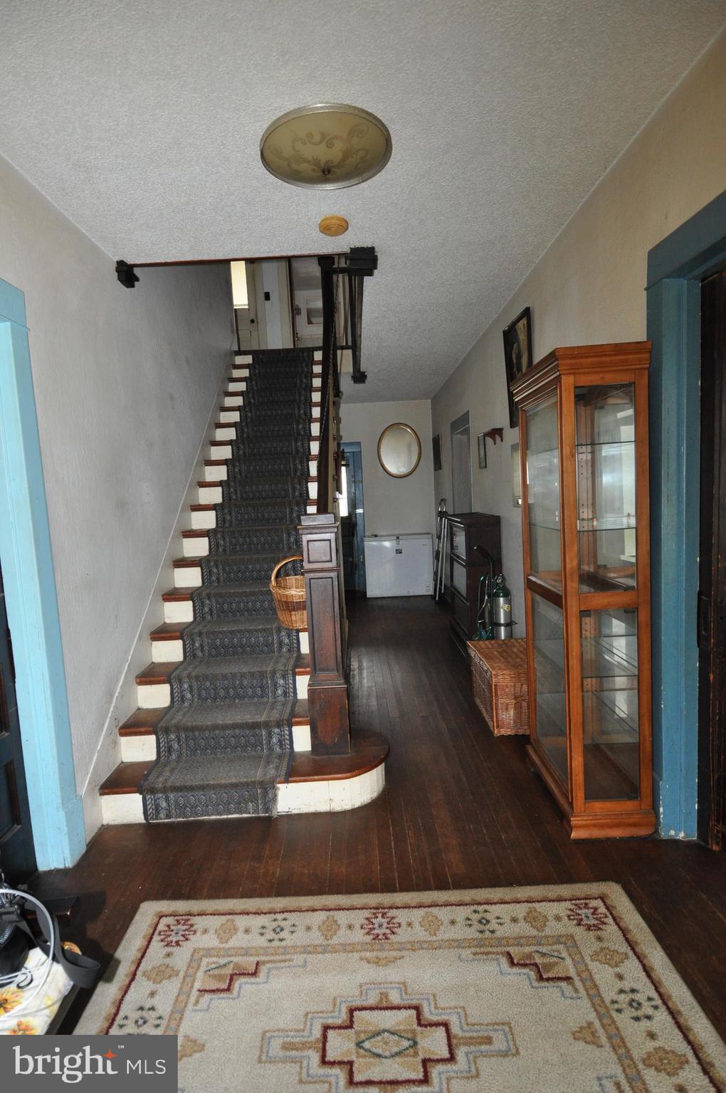 105 Front Street Pocomoke City, MD 21851 - Photo 17 of 50 a view of entryway and hall with wooden floor