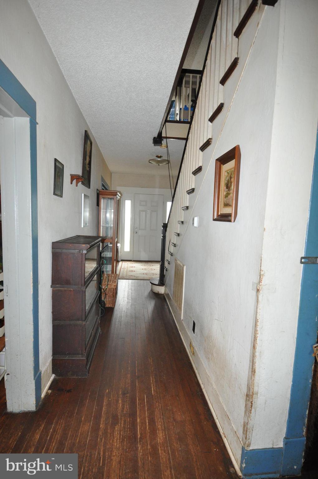 105 Front Street Pocomoke City, MD 21851 - Photo 18 of 50 a view of entryway and hall with wooden floor