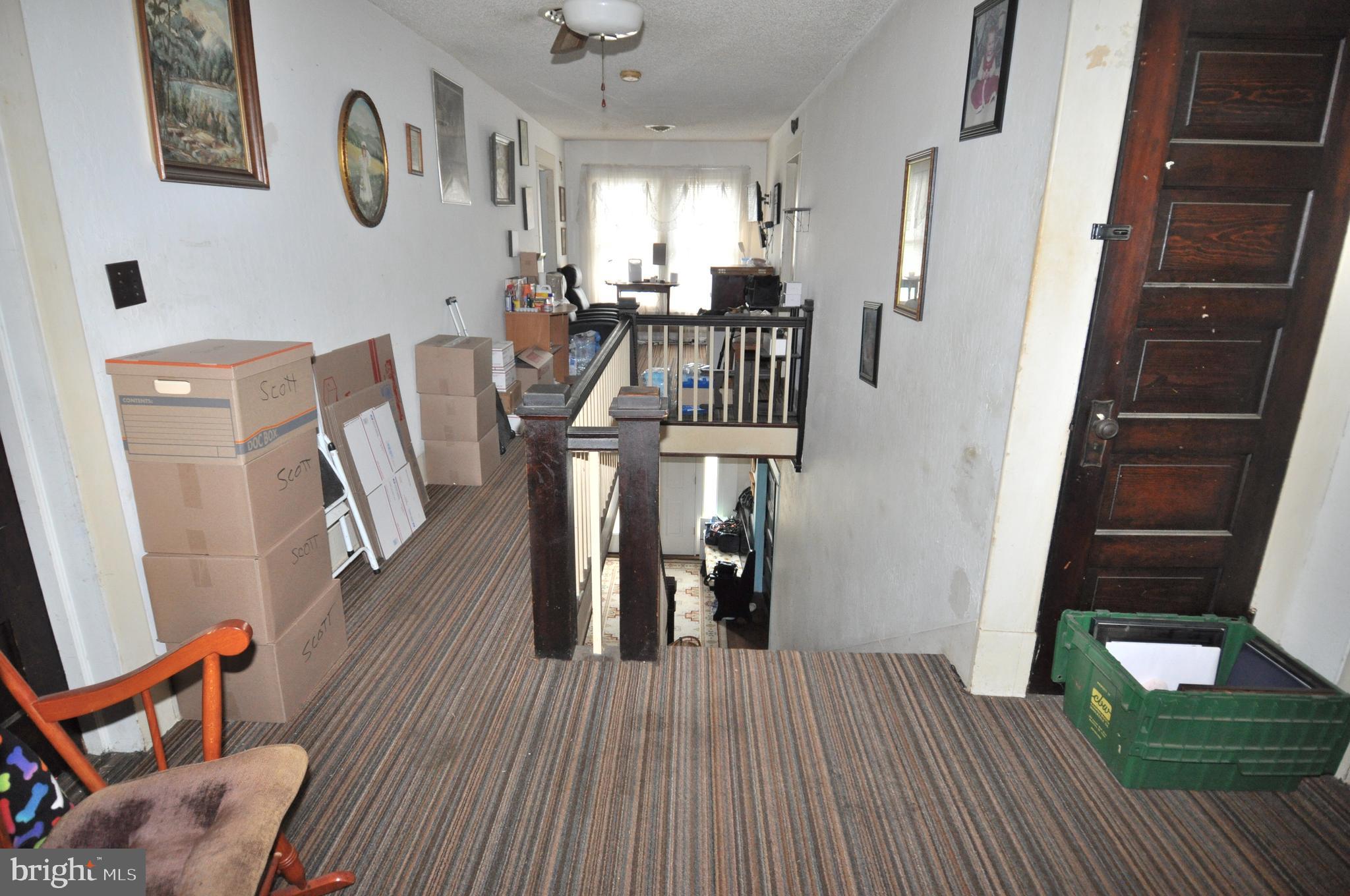 105 Front Street Pocomoke City, MD 21851 - Photo 19 of 50 a view of a living room and dining room