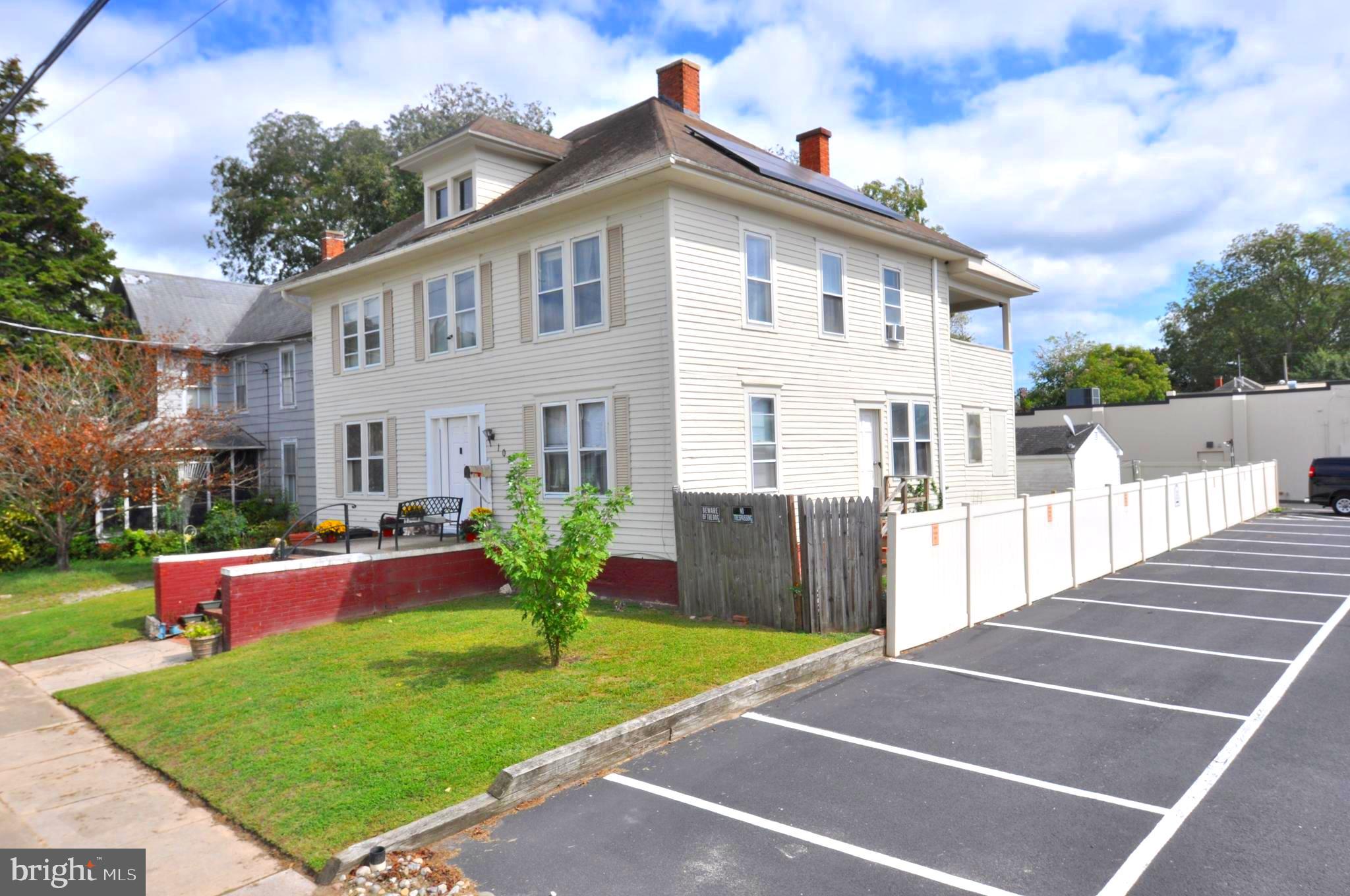 105 Front Street Pocomoke City, MD 21851 - Photo 2 of 50 a view of a house with a yard and porch