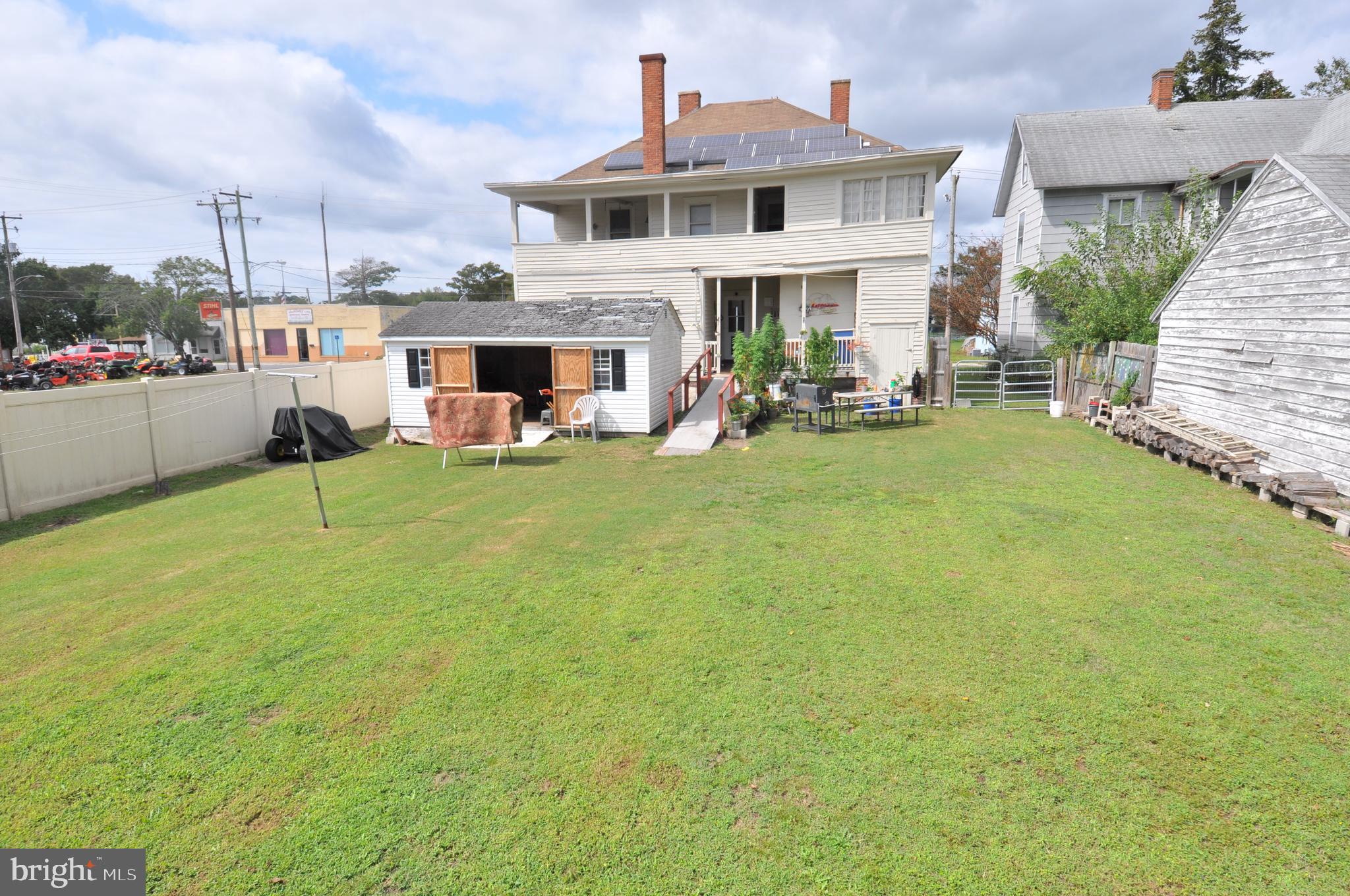 105 Front Street Pocomoke City, MD 21851 - Photo 37 of 50 a view of a house with patio