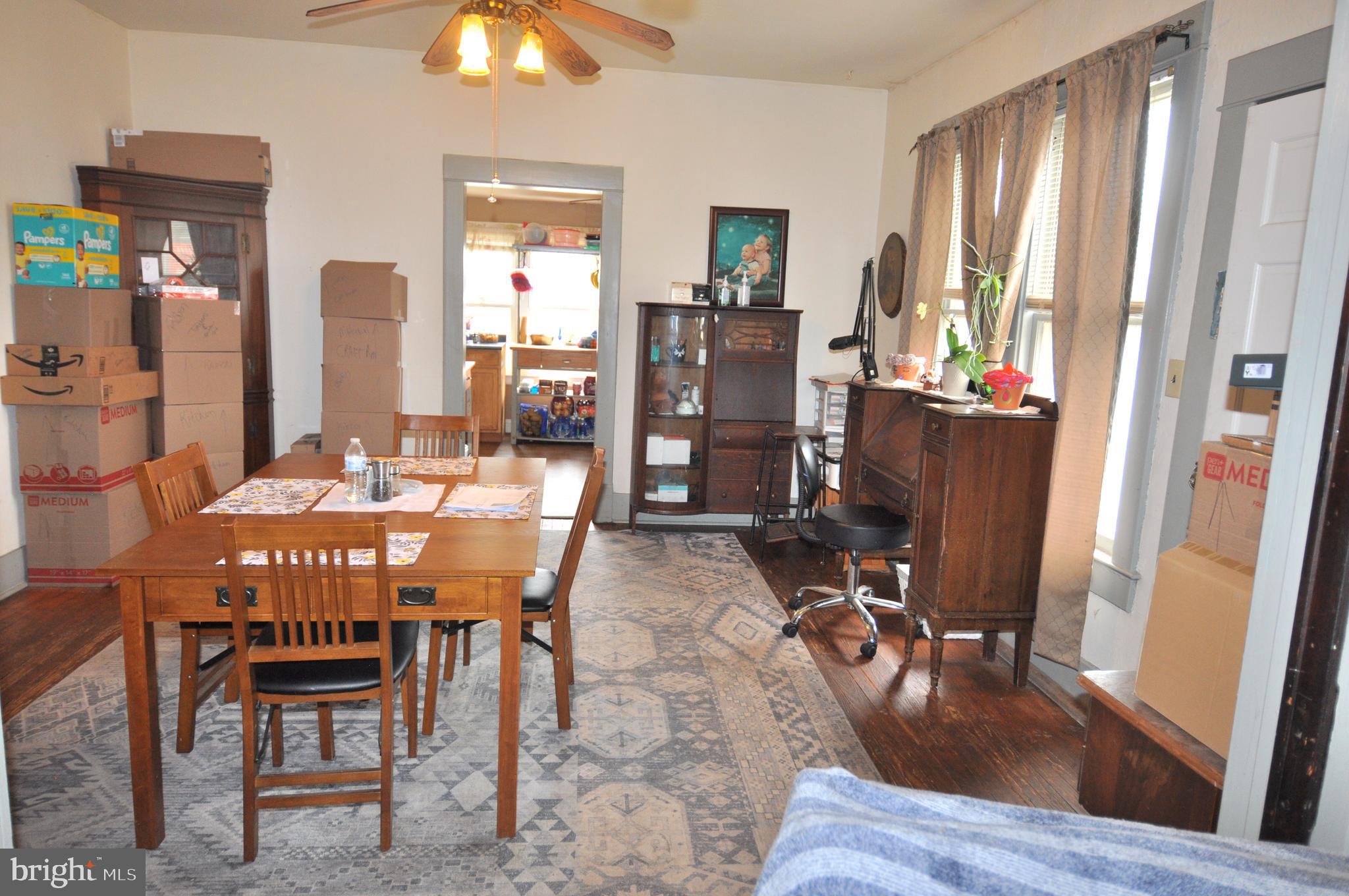 105 Front Street Pocomoke City, MD 21851 - Photo 7 of 50 a dining room with furniture and window