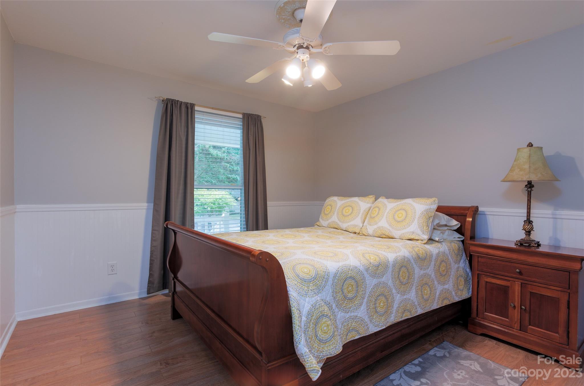 256 Georgewoods Drive Dallas, NC 28034 - Photo 22 of 45 a bedroom with a bed and a window