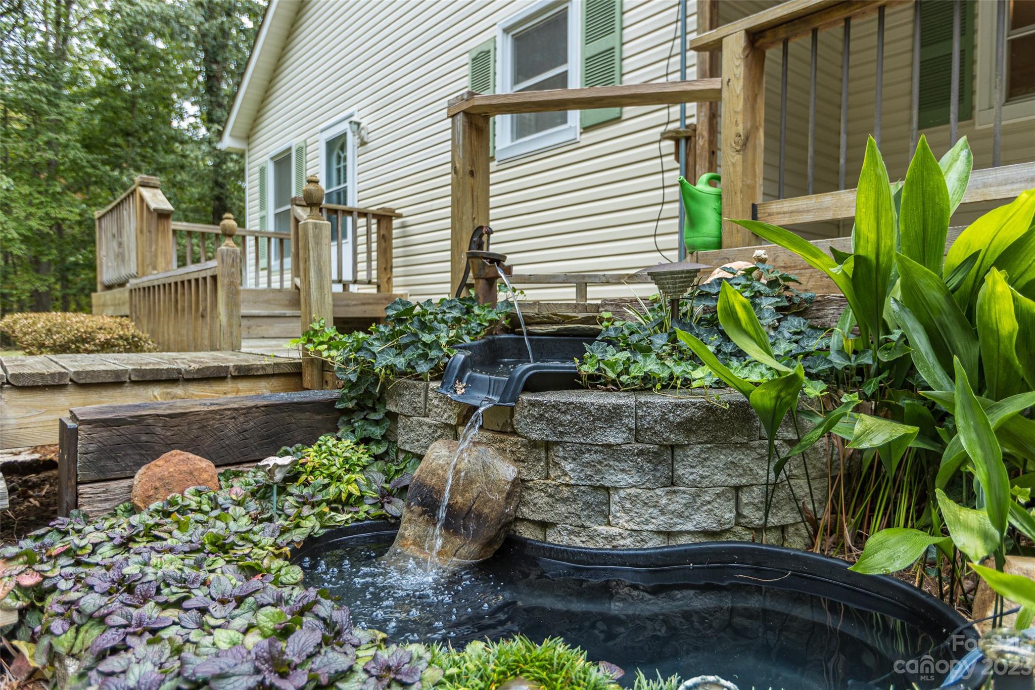 256 Georgewoods Drive Dallas, NC 28034 - Photo 28 of 45 a front view of a house with a yard