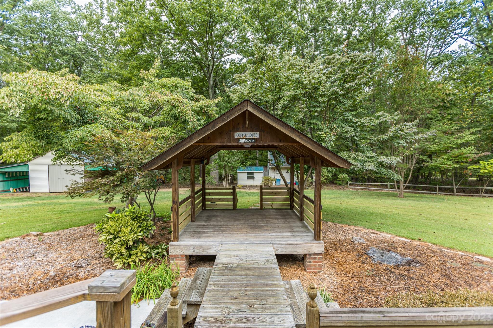 256 Georgewoods Drive Dallas, NC 28034 - Photo 29 of 45 a view of a house with a yard