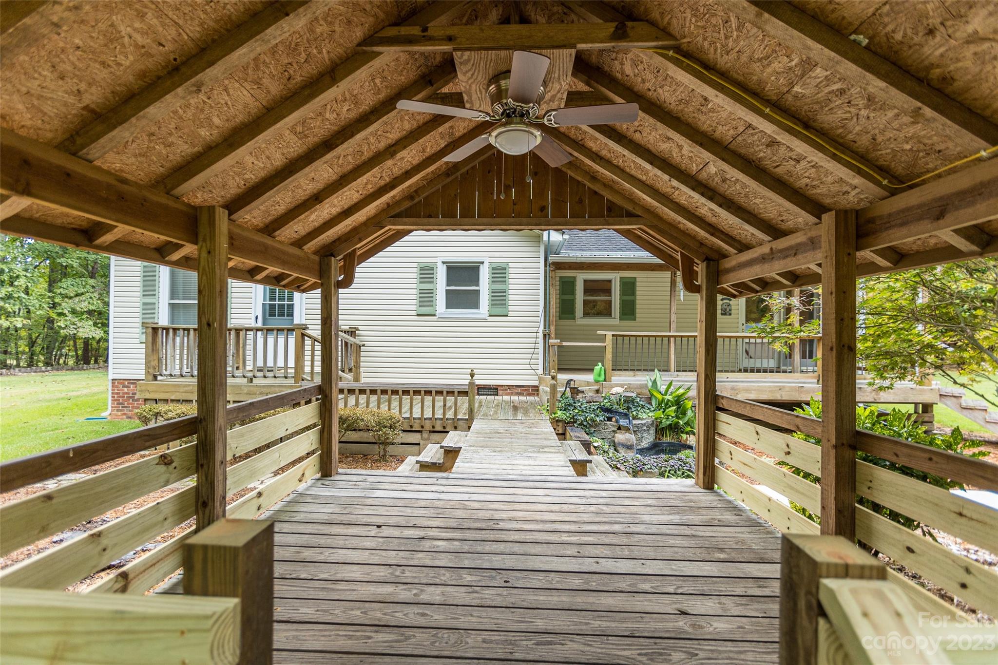 256 Georgewoods Drive Dallas, NC 28034 - Photo 30 of 45 a front view of a house with a yard