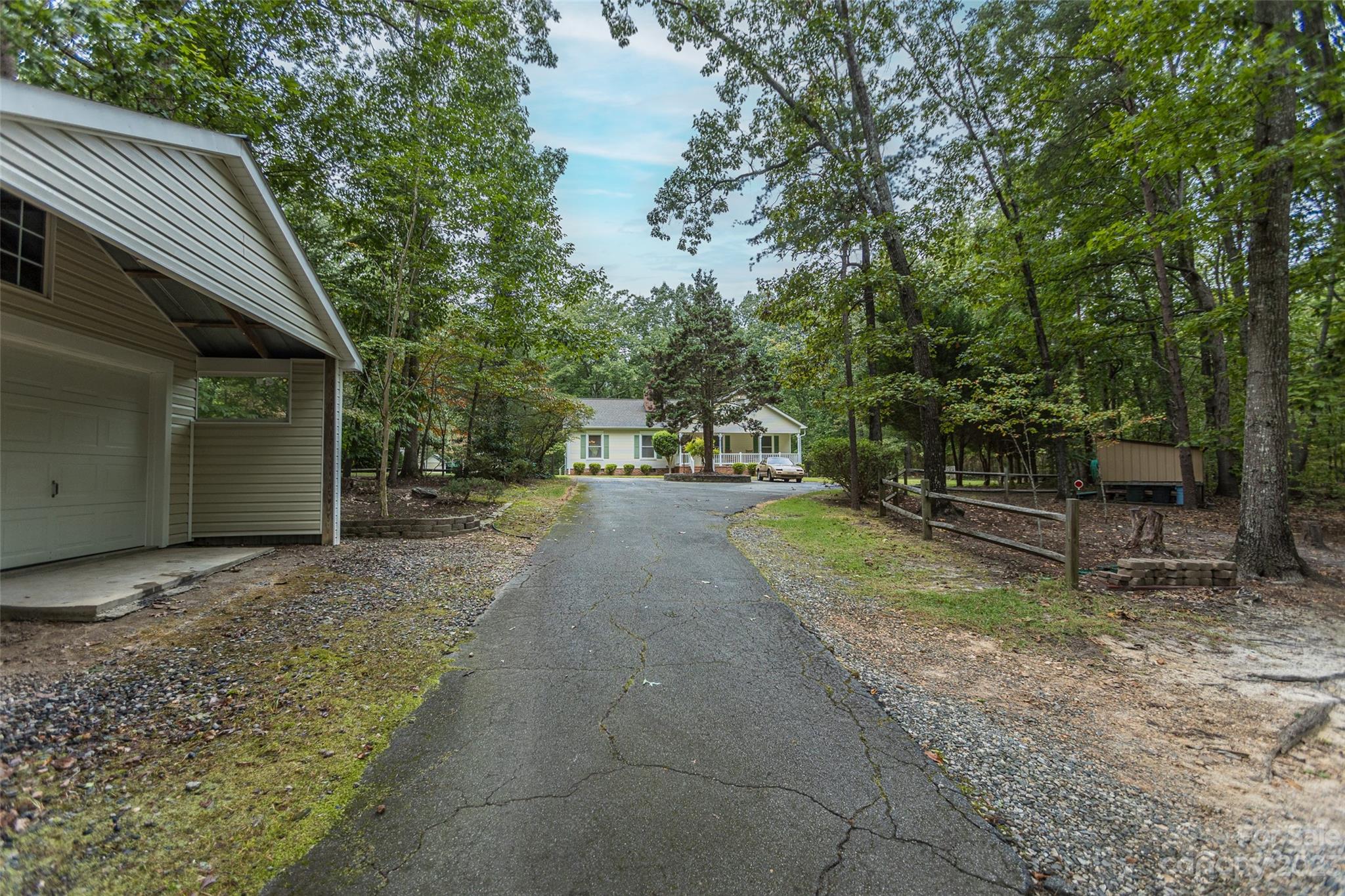 256 Georgewoods Drive Dallas, NC 28034 - Photo 3 of 45 a view of a yard with tree s