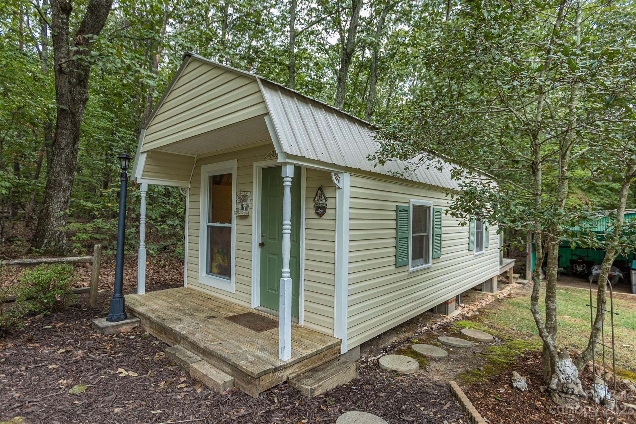 256 Georgewoods Drive Dallas, NC 28034 - Photo 32 of 45 a view of a house with a yard