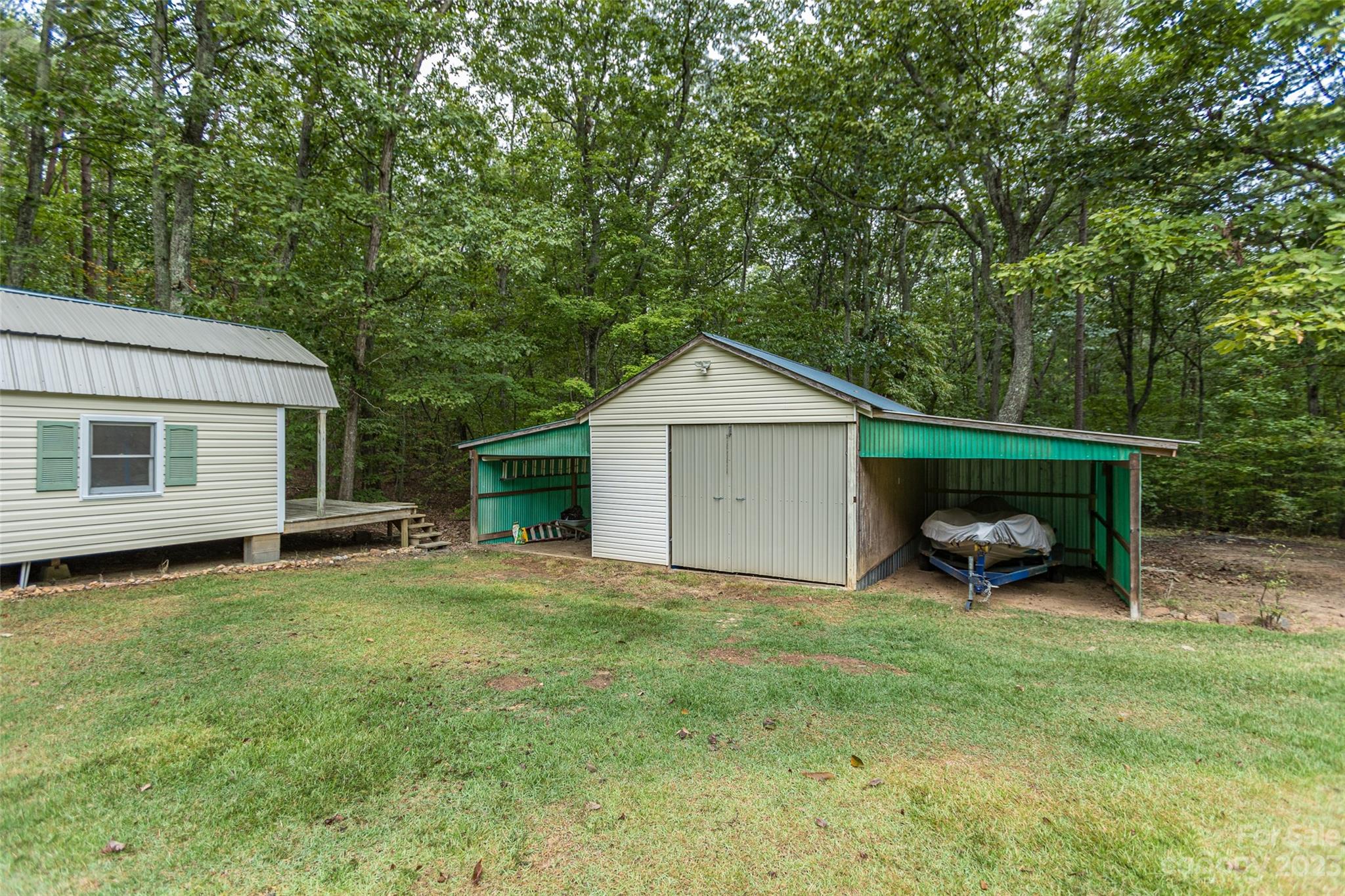 256 Georgewoods Drive Dallas, NC 28034 - Photo 33 of 45 a view of a house with a yard