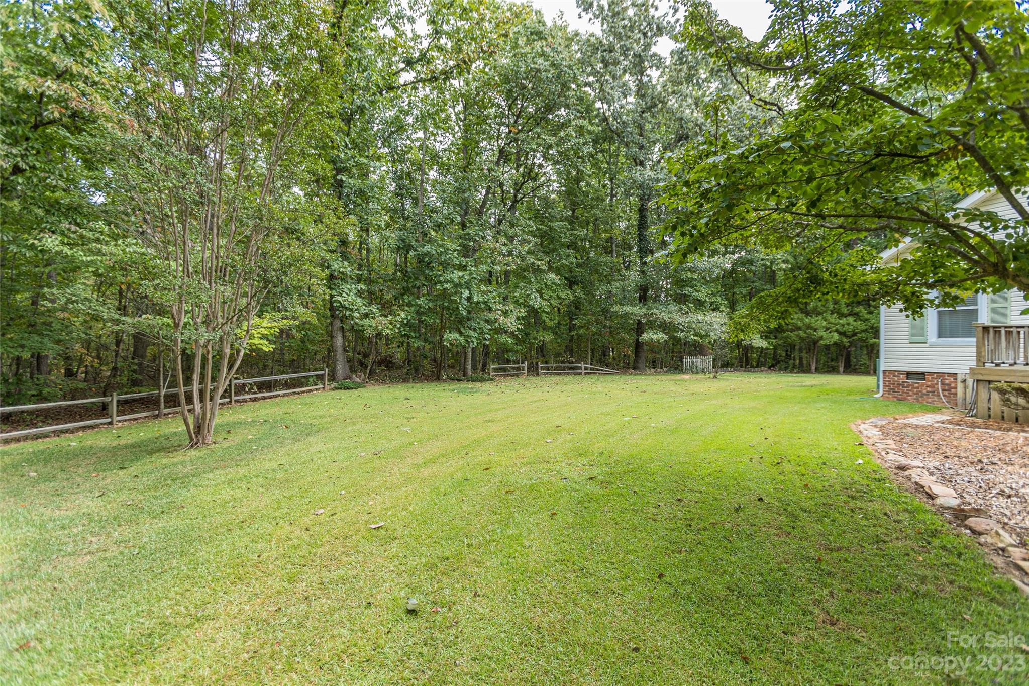 256 Georgewoods Drive Dallas, NC 28034 - Photo 36 of 45 a view of a field with a trees