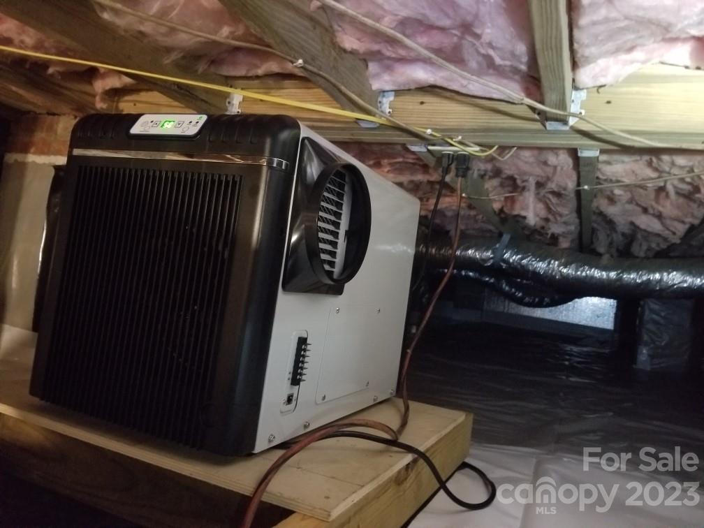 256 Georgewoods Drive Dallas, NC 28034 - Photo 40 of 45 a view of walk in closet with clothes and shoes
