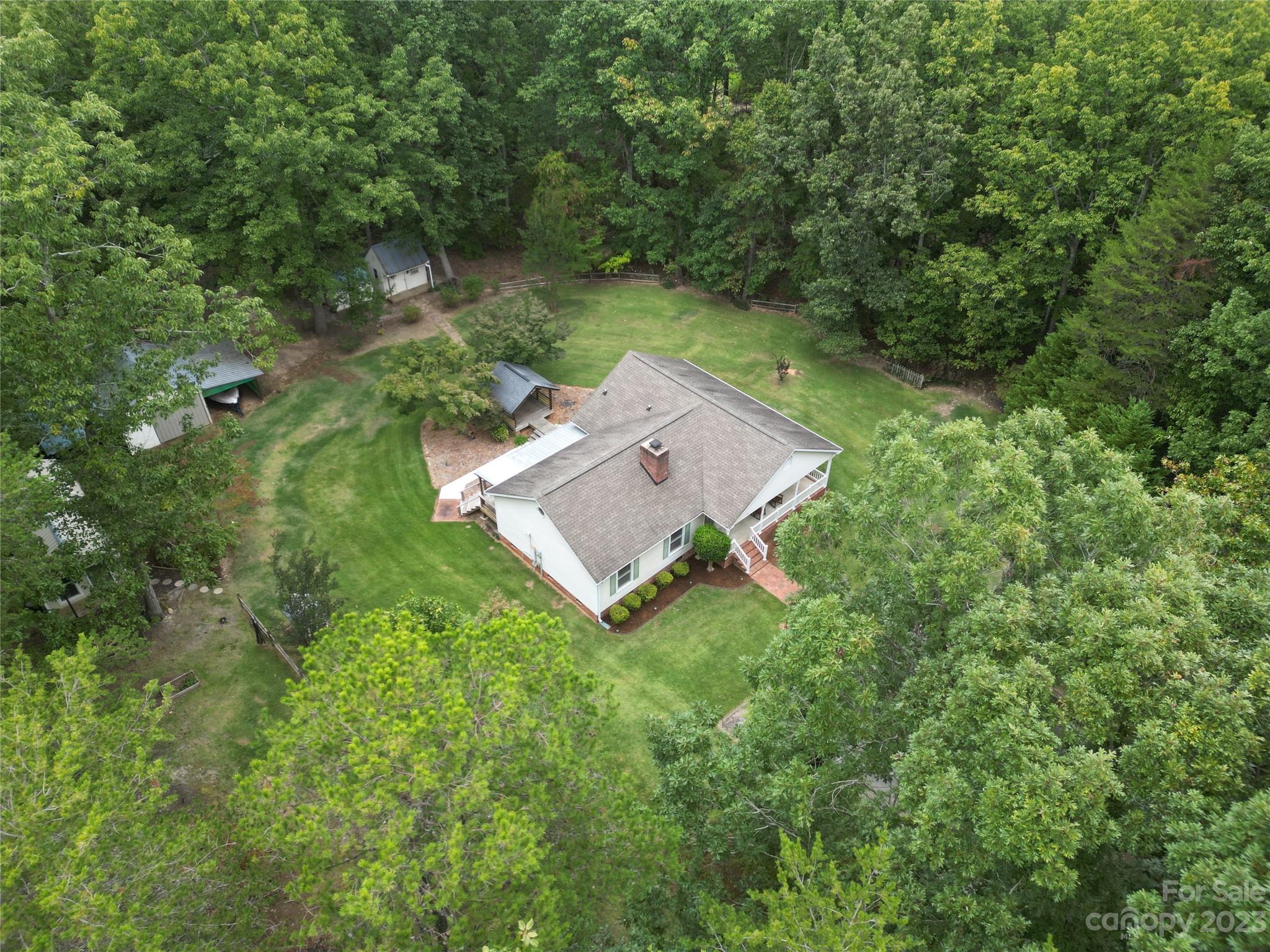256 Georgewoods Drive Dallas, NC 28034 - Photo 43 of 45 an aerial view of a house with a yard